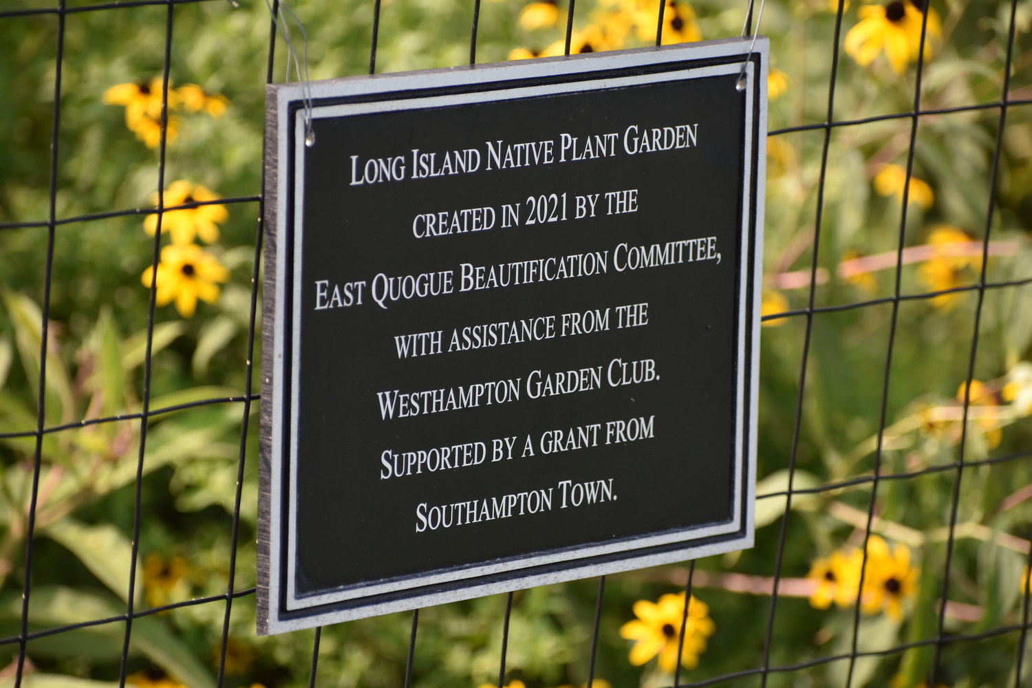 East Quogue Pollinator Garden dedication plaque. BRENDAN J. O'REILLY