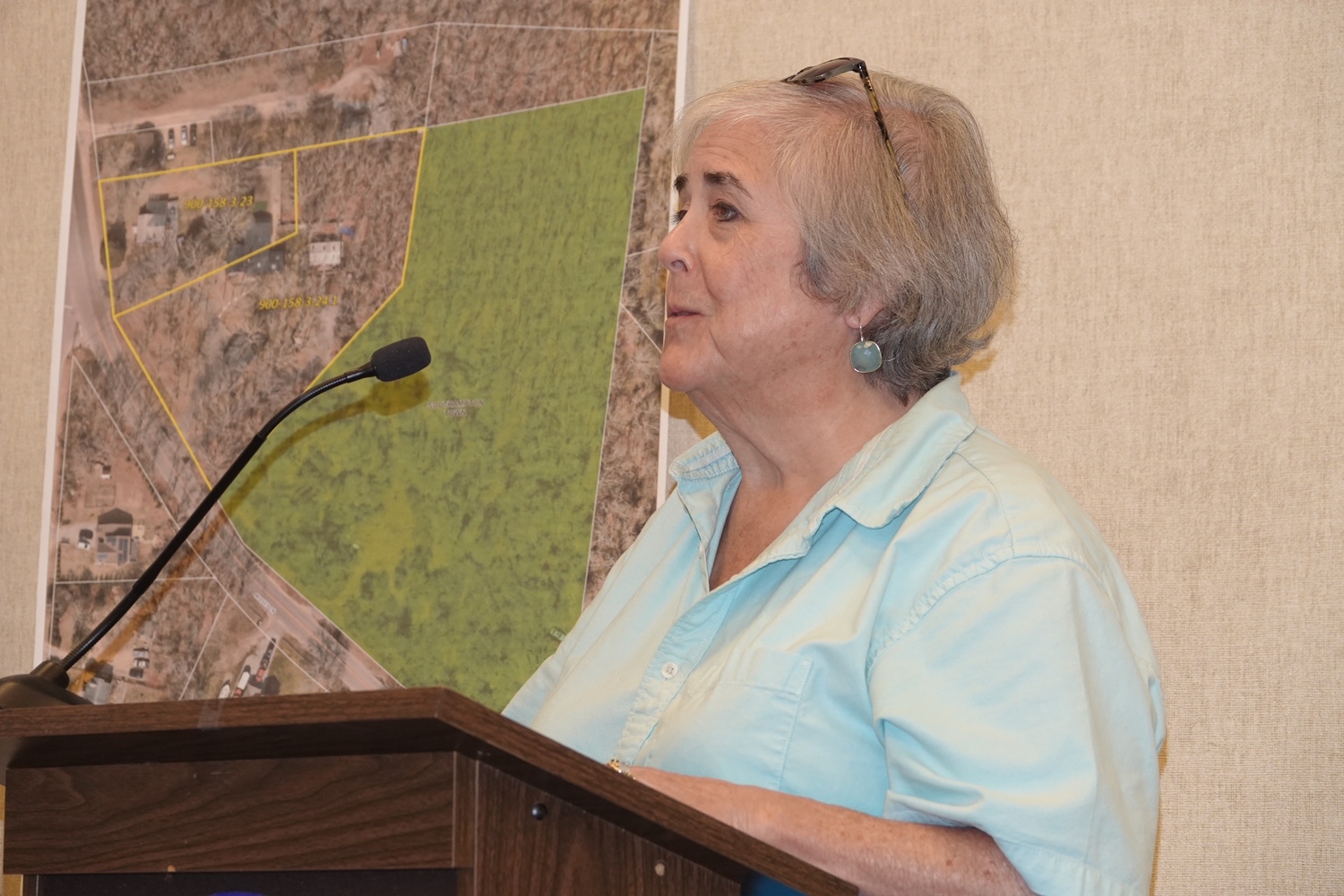 Ellen Dioguardi, president of the Sag Harbor Chamber of Commerce, urged the Southampton Board to approve a $1.3 million workforce housing deed restriction on the six-unit building in Sag Harbor that she called 