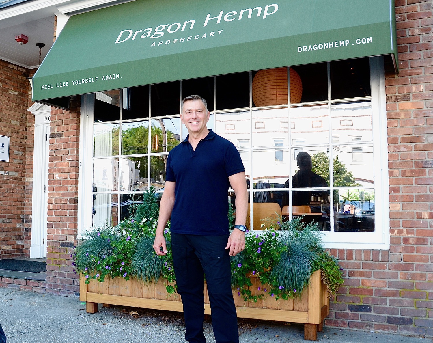 Sag Harbor business owner Kevin Menard at his Dragon Hemp Apothecary on Main Street. KYRIL BROMLEY