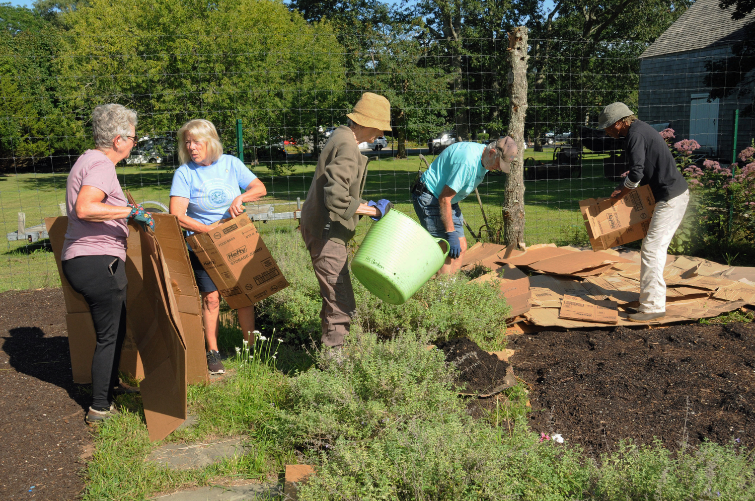 ReWild Long Island and members of the community came to the the East Hampton Town Historical Farm Museum on August 2 to restore the pollinator garden  designed by Matthew L. Lester who lost his life in 2017.      RICHARD LEWIN