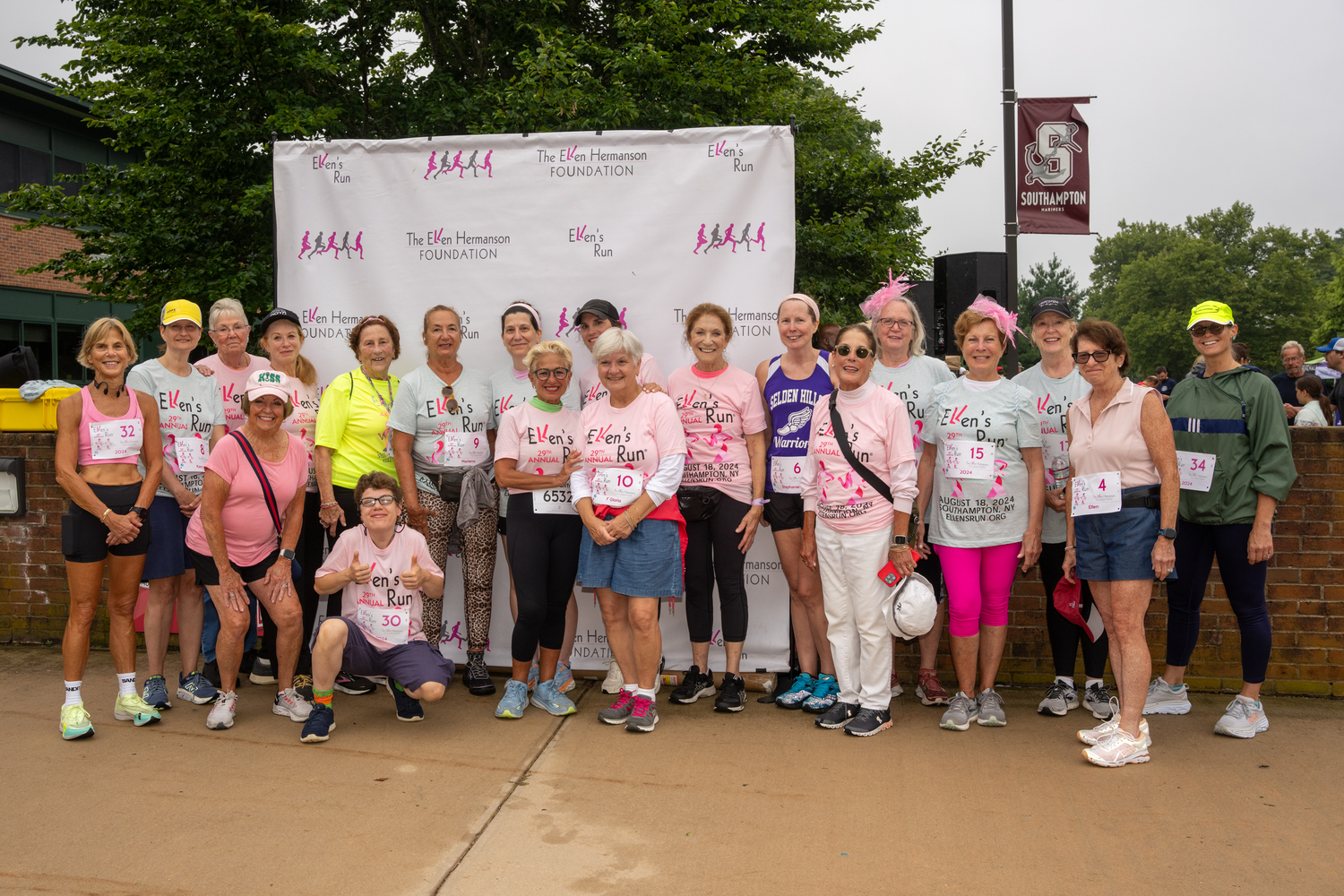 Breast cancer survivors take their annual photo at Ellen's Run.   RON ESPOSITO