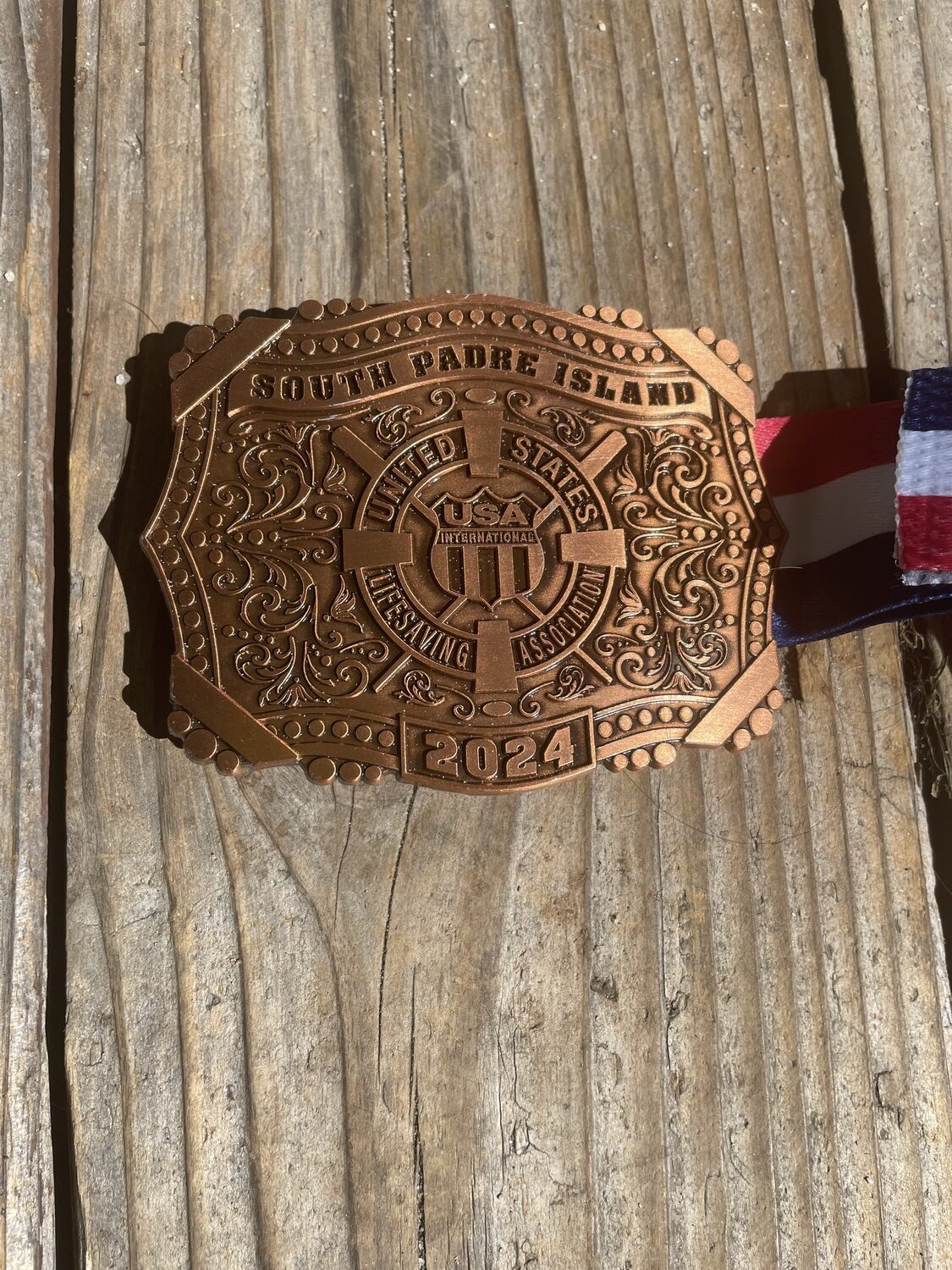 The medals at USLA Nationals were belt buckles, in true Texas style. CAILIN RILEY