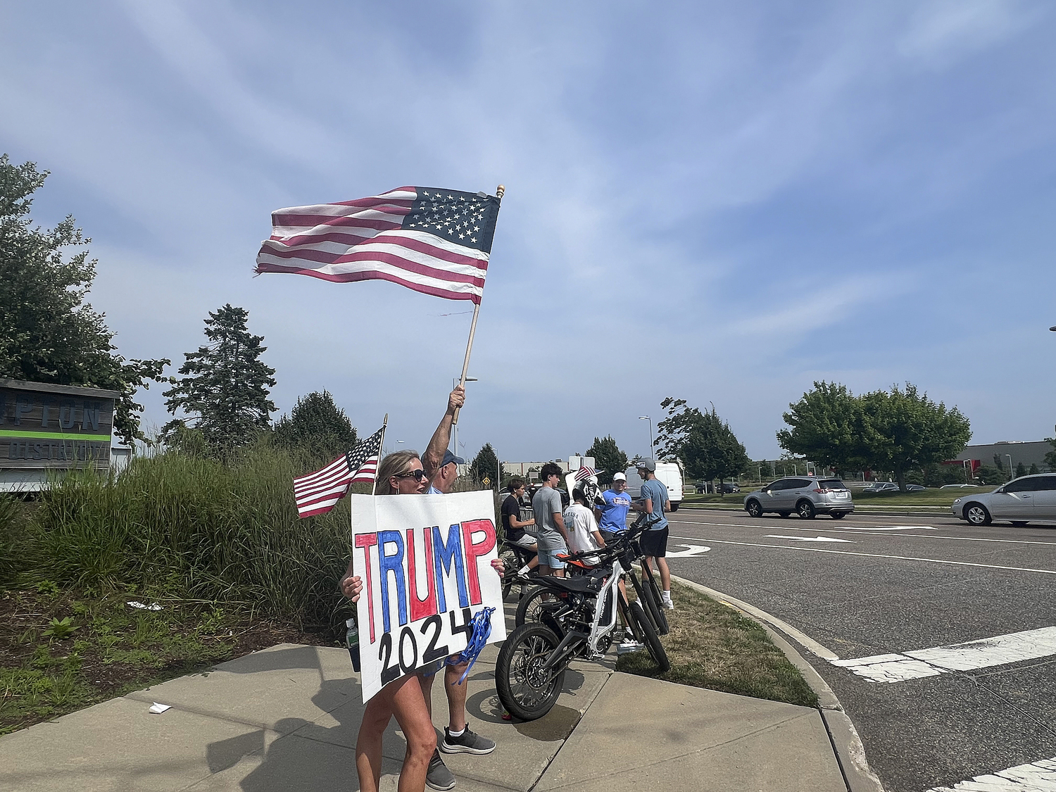 Supporters of former President Donald Trump lined a portion of Old Riverhead Road near Gabreski Airport in Westhampton Beach, waiting for hours to catch a glimpse of the passing motorcade. The former President's visit to the Bridgehampton home of Cantor Fitzgerald CEO Howard Lutnick for a campaign fundraiser. The visit brought traffic to a standstill across the east end for hours on Friday evening.  DANA SHAW