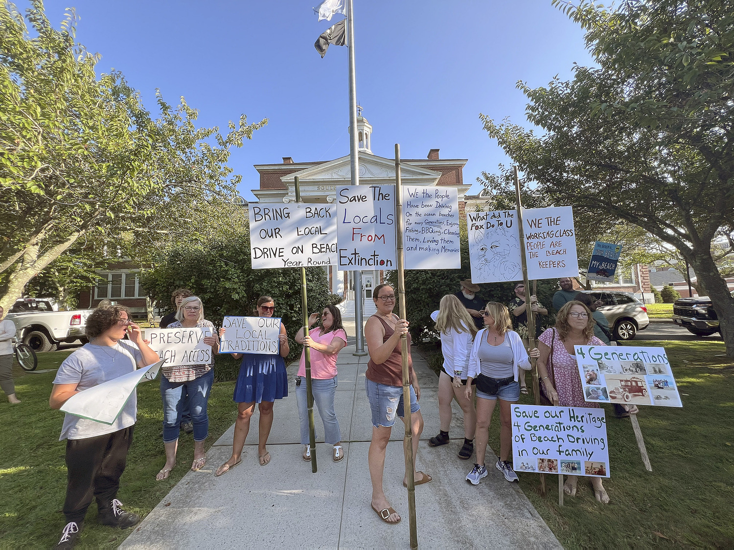 Frequenters of the Southampton Village beach known as the Picnic Area rallied outside Southampton Town Hall on Tuesday afternoon, then pleaded with the Southampton Town Board to find a way to amend the town’s piping plover protection program after the birds left their favorite summer haunt essentially off limits from early June through August 13.   DANA SHAW