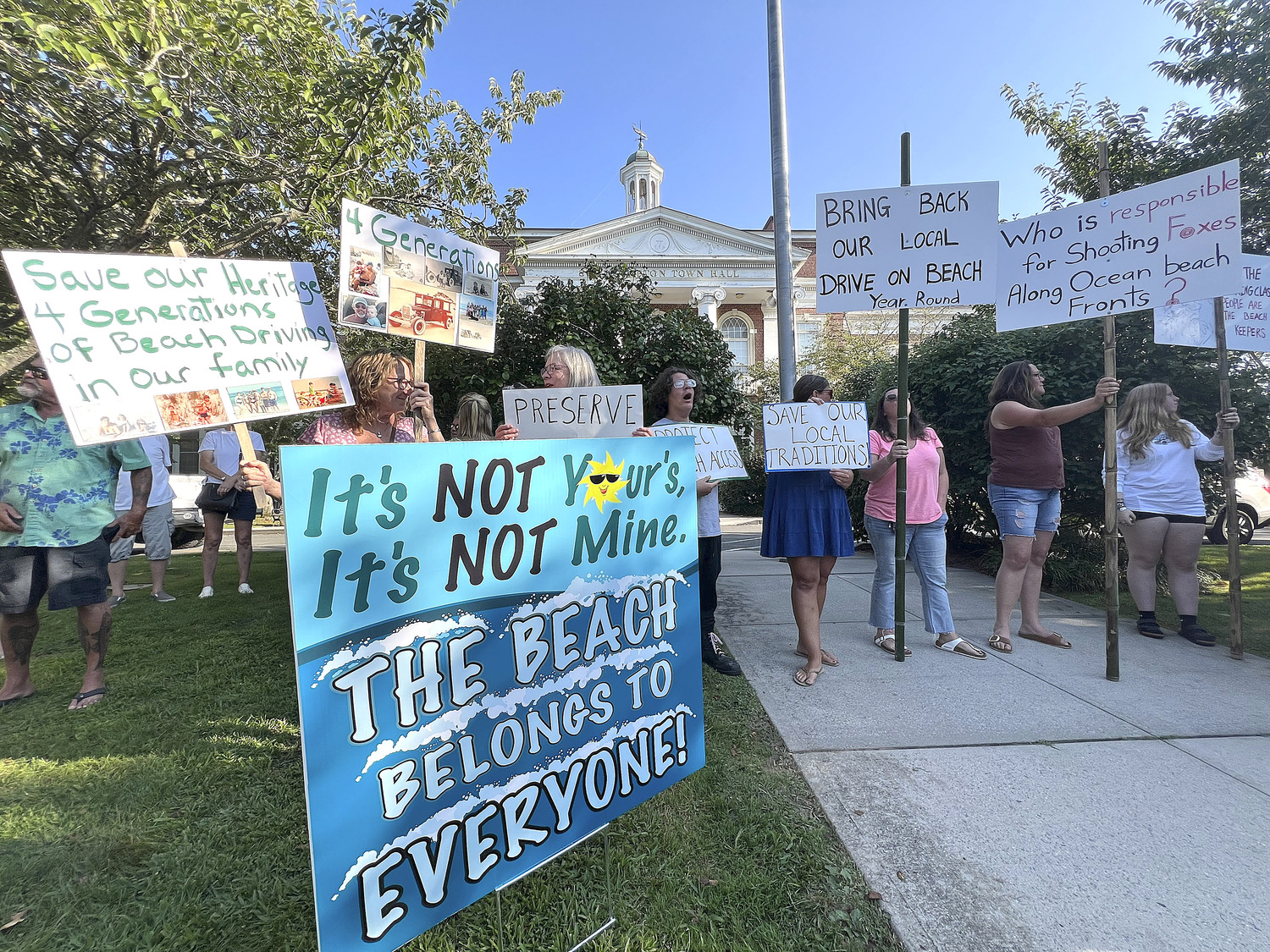 Frequenters of the Southampton Village beach known as the Picnic Area rallied outside Southampton Town Hall on Tuesday afternoon, then pleaded with the Southampton Town Board to find a way to amend the town’s piping plover protection program after the birds left their favorite summer haunt essentially off limits from early June through August 13.   DANA SHAW