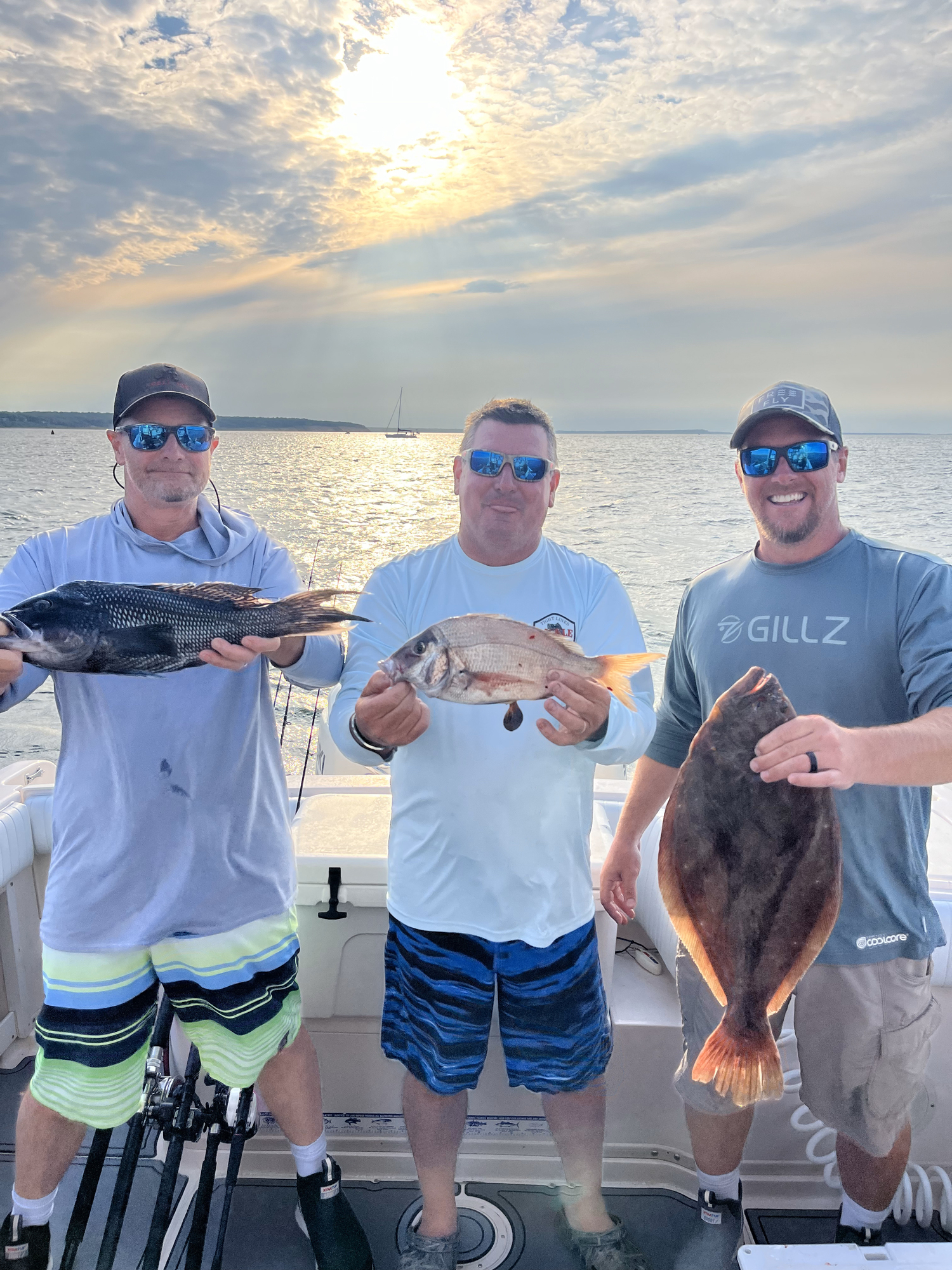 Mark Daniels, Jason Lester and Mike Kromer with their recent catch from Montauk waters.