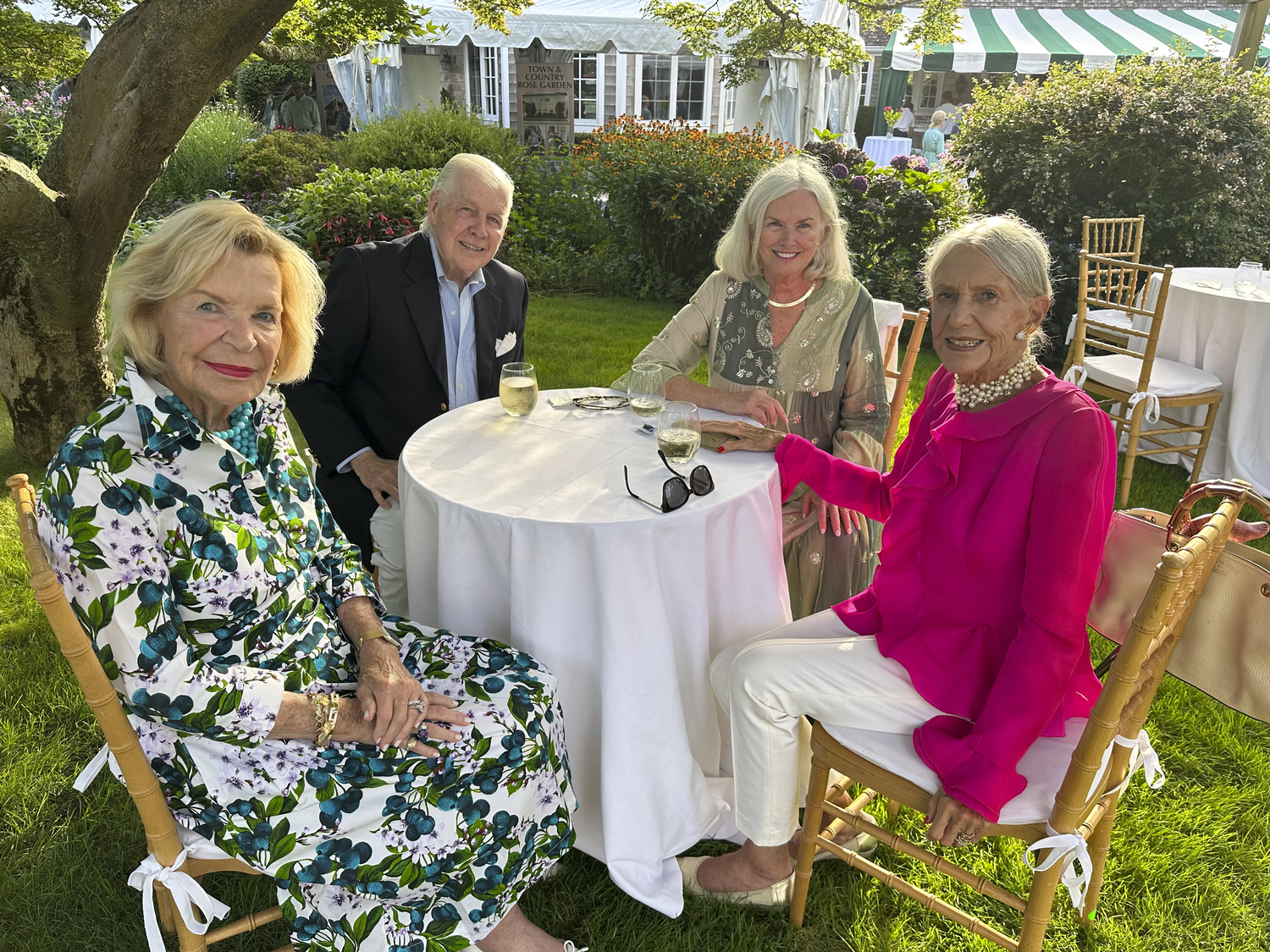 Patty Kraus, Jim Berkrot and Kim White at the Rose Society Cocktail Party.   GREGORY D'ELIA