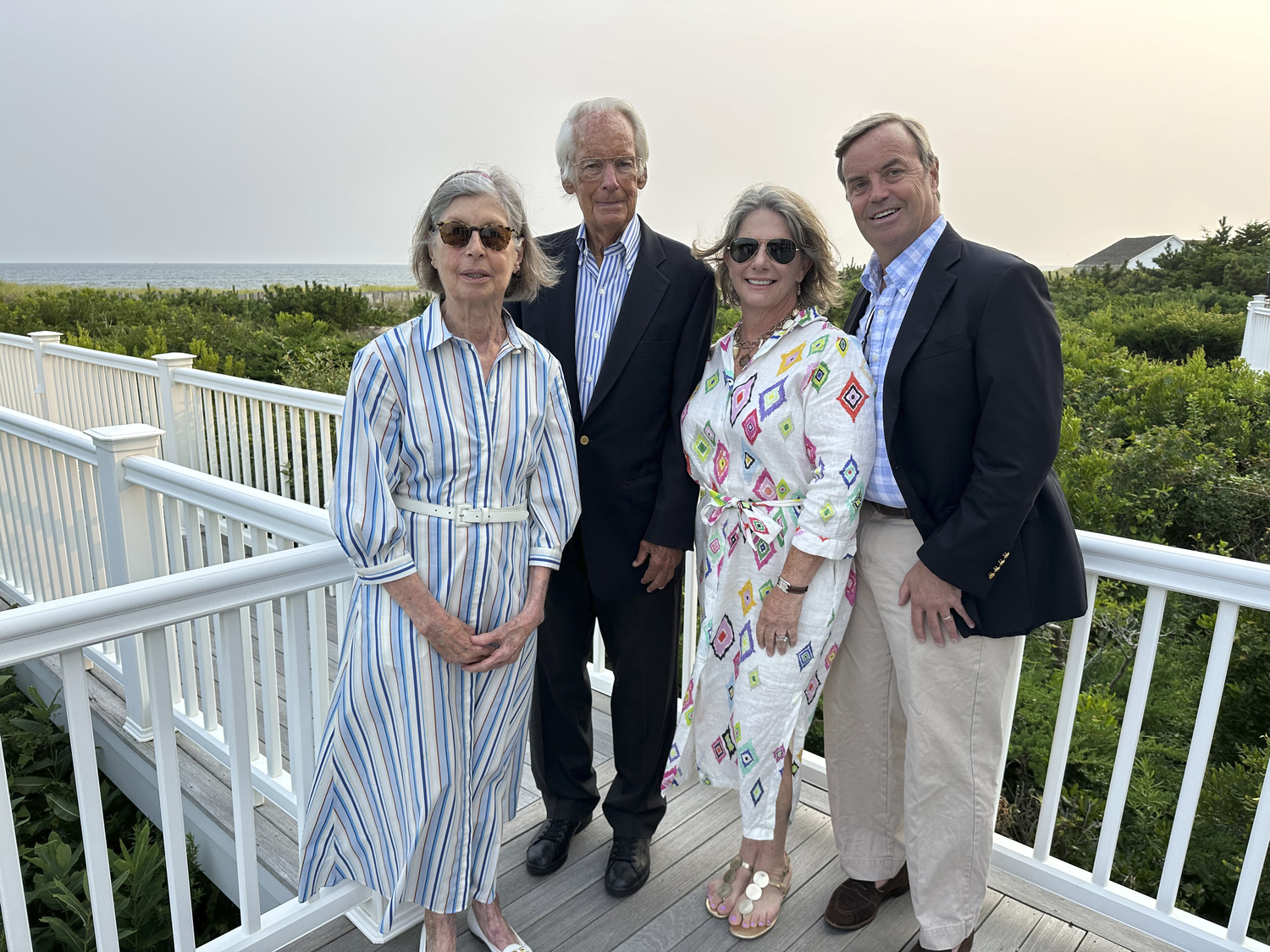 Janet and Joseph Smyth and Phil and Kristen Smyth at the Peconic Baykeeper cocktail party.    GREGORY D'ELIA