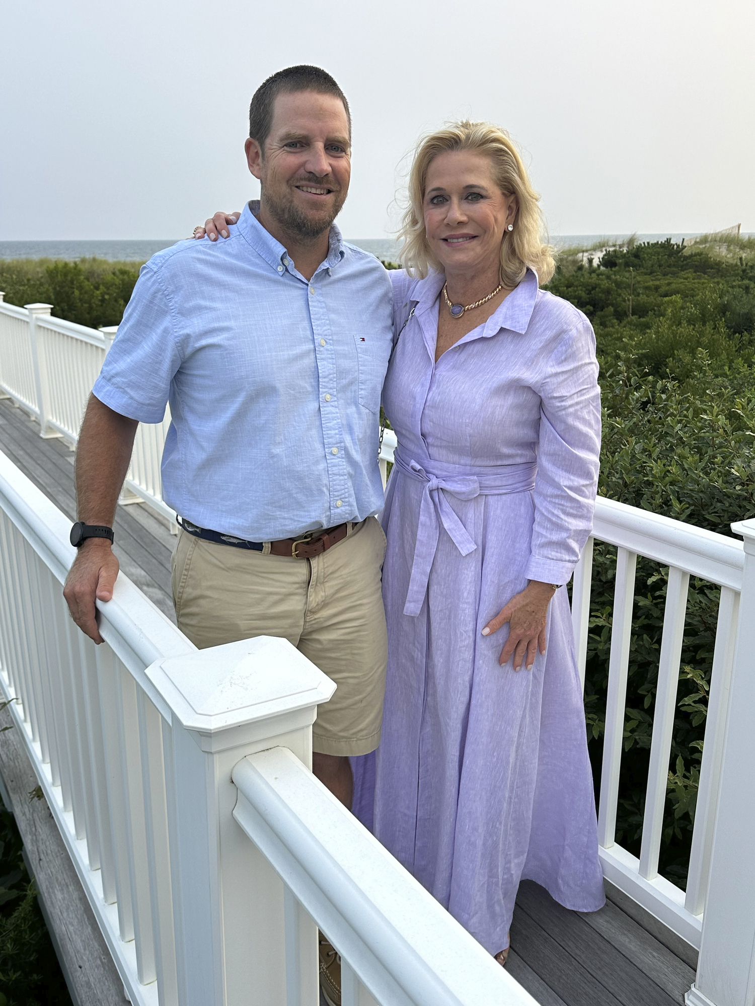 Baykeeper Pete Topping and Kim White at the Peconic Baykeeper cocktail party.    GREGORY D'ELIA