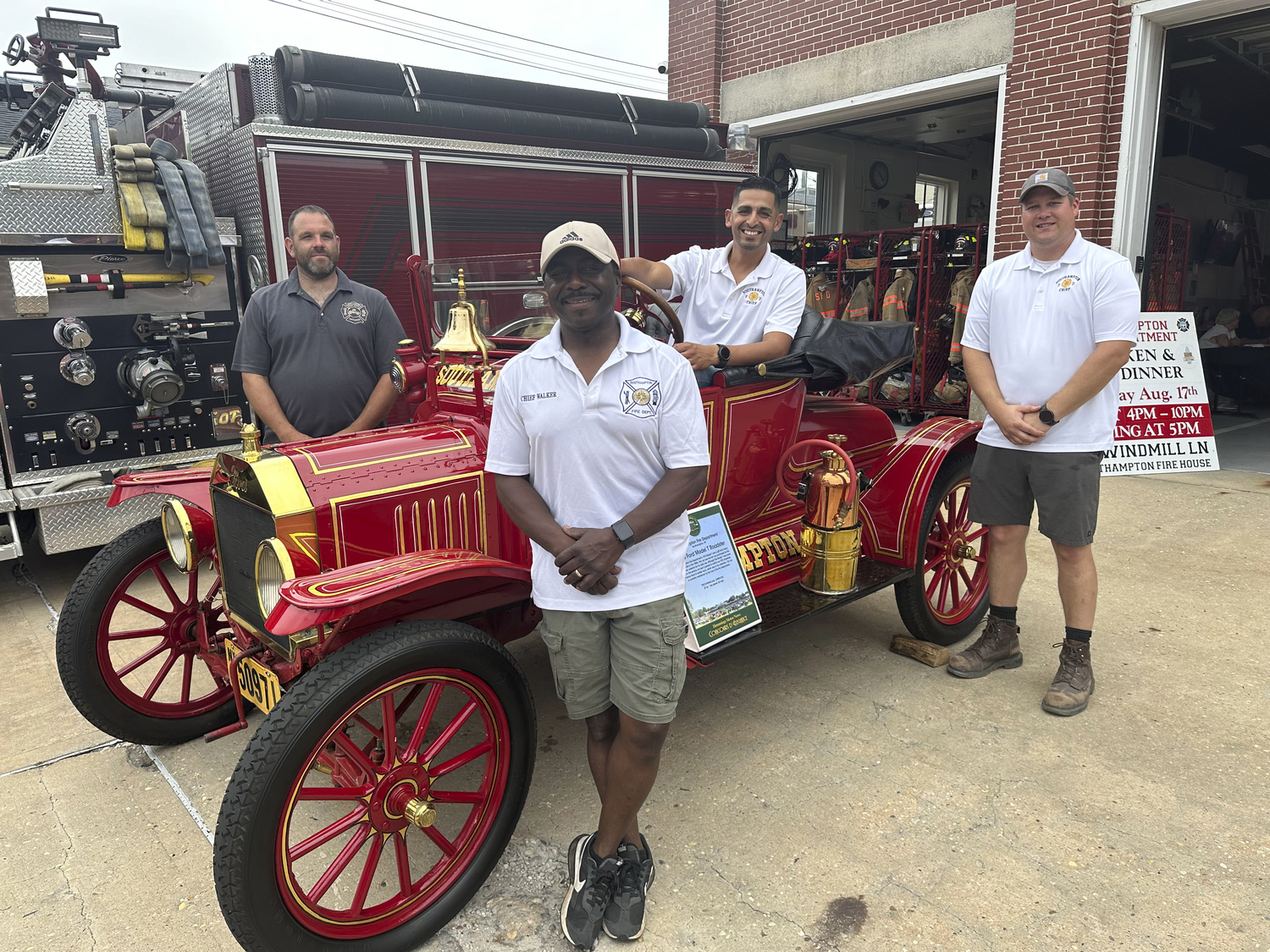 Eric Halsey, Polis Walker, Manny Escobar and Richard Fowler at the Fire Departments chicken and ribs BBQ.   GREGORY D'ELIA