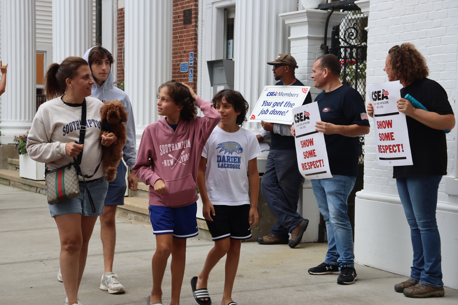 Several CSEA union members employed by Southampton Village, mainly those who work in the building maintenance department, rallied in front of village hall on Thursday, August 8. They feel they have been disrespected by both the current and previous village administrations. Immediately following the rally, they signed a contract that had been first ratified in the spring of 2023. CAILIN RILEY