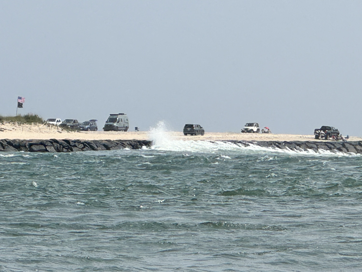 Big waves hit the jetty at Shinnecock East County Park on Saturday. MICHAEL WRIGHT