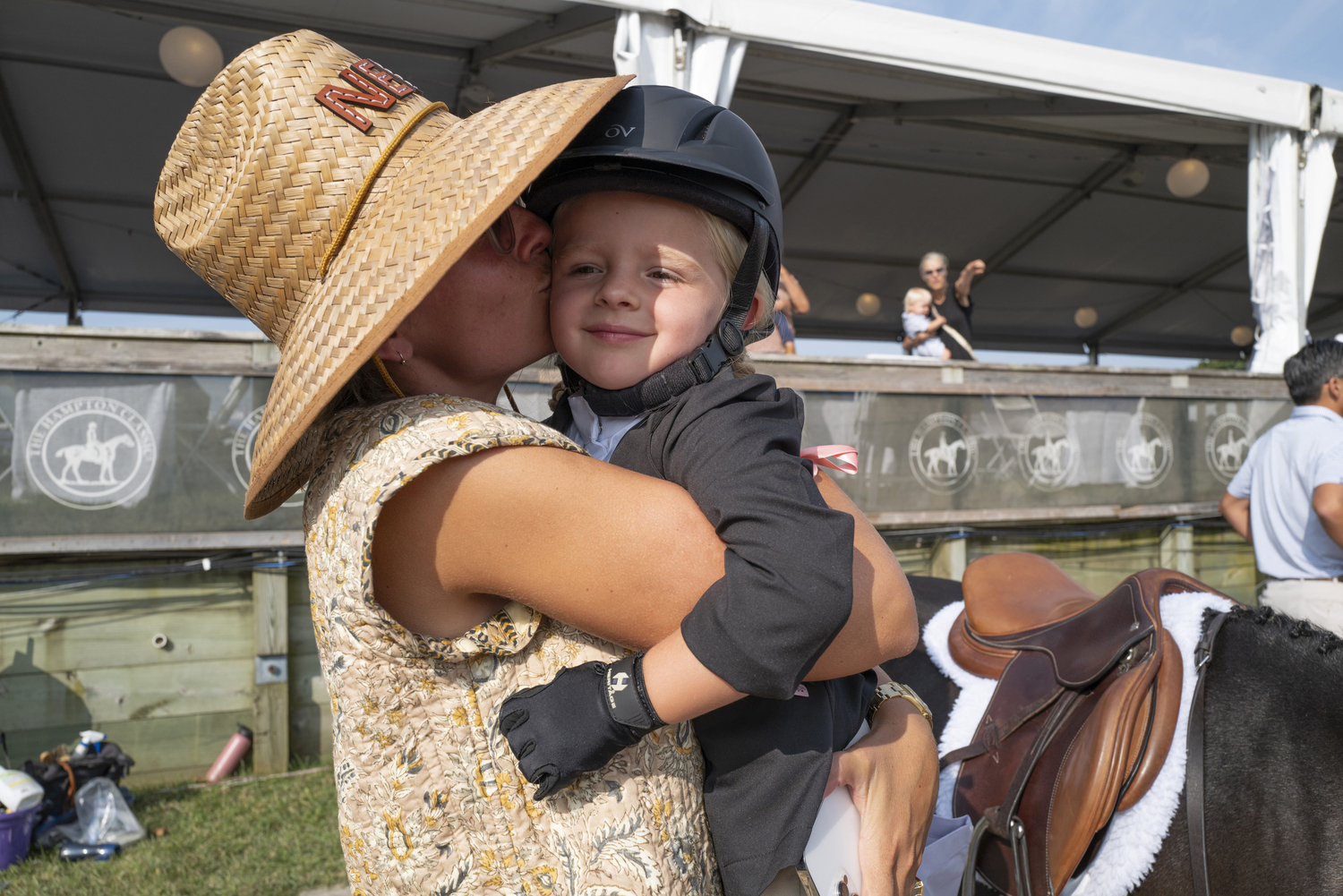 Scout Spooner with her mom, Nell Blagg, after a great performance in the leadline on Sunday.   LORI HAWKINS