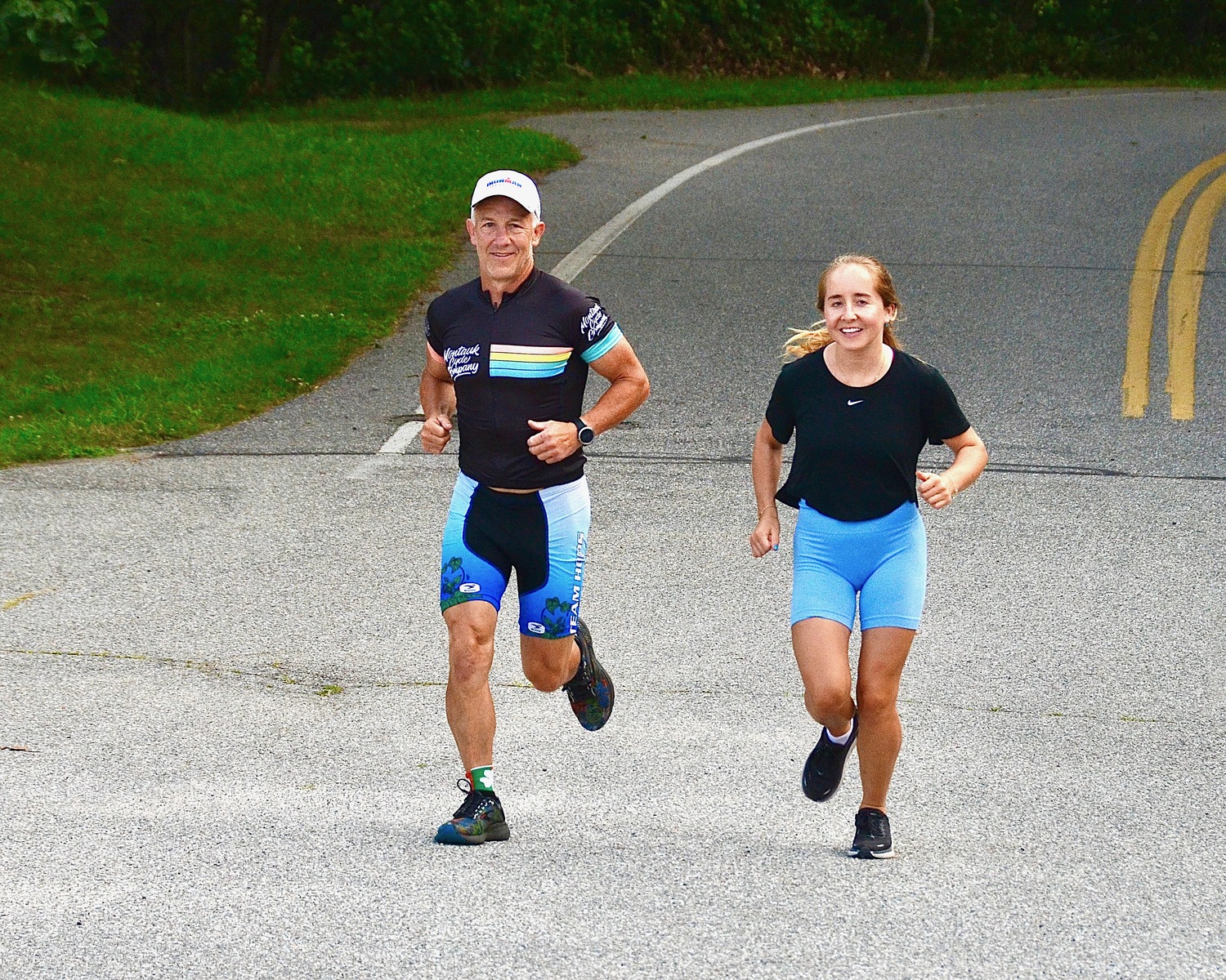 East Hampton resident Mike Bahel and his daughter, Alyssa, training for the Montauk Lighthouse Triathlon. KYRIL BROMLEY