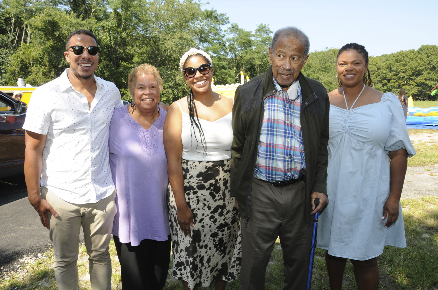 Jason Lightning, Barbara North-Lightning, Maegan North, Dr. Robert North and Blaine North at Bridgehampton Day at the Bridgehampton Child Care & Recreation Center on Saturday.  Dr. North was recognized at the event for his contributions to the Bridgehampton community.   RICHARD LEWIN