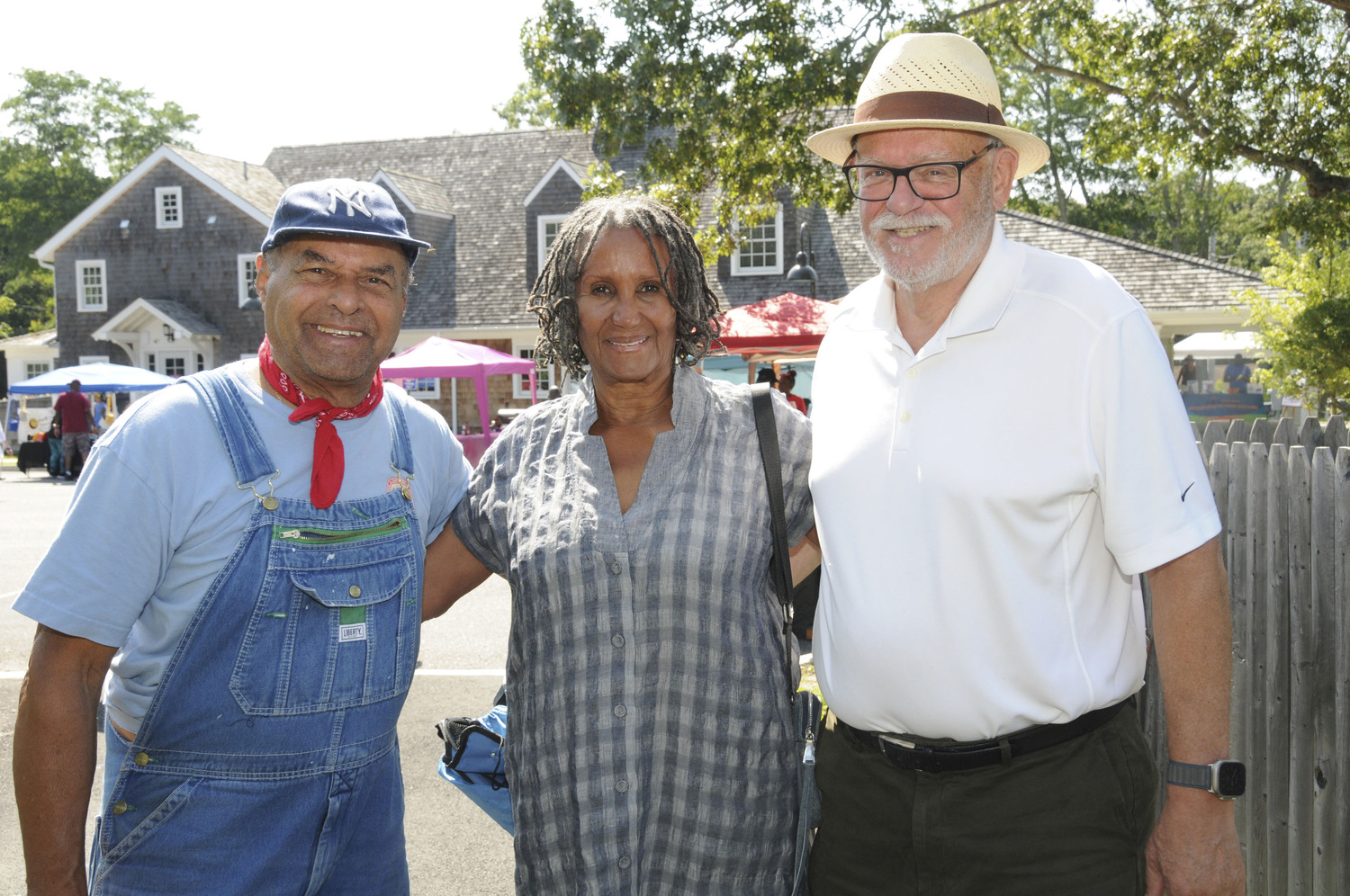 Harry Campbell, Valerie Cuyjet and Greg Cuyjet at Bridgehampton Day at the Bridgehampton Child Care & Recreation Center on Saturday.   RICHARD LEWIN