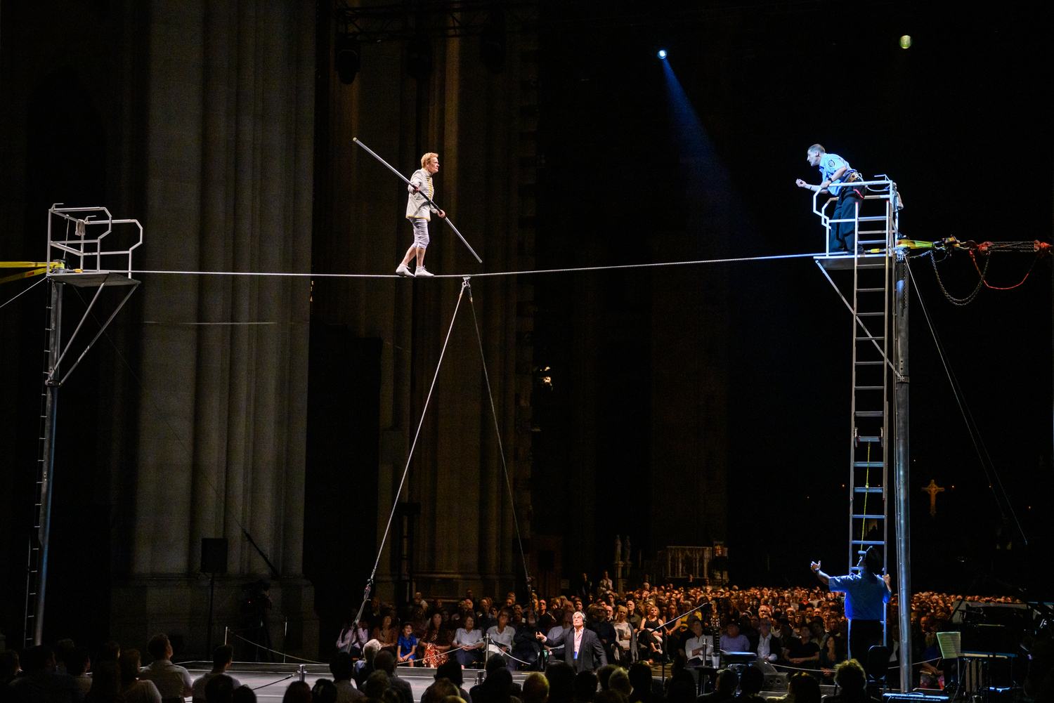 High wire artist Philippe Petit taunts the police in his performance of 