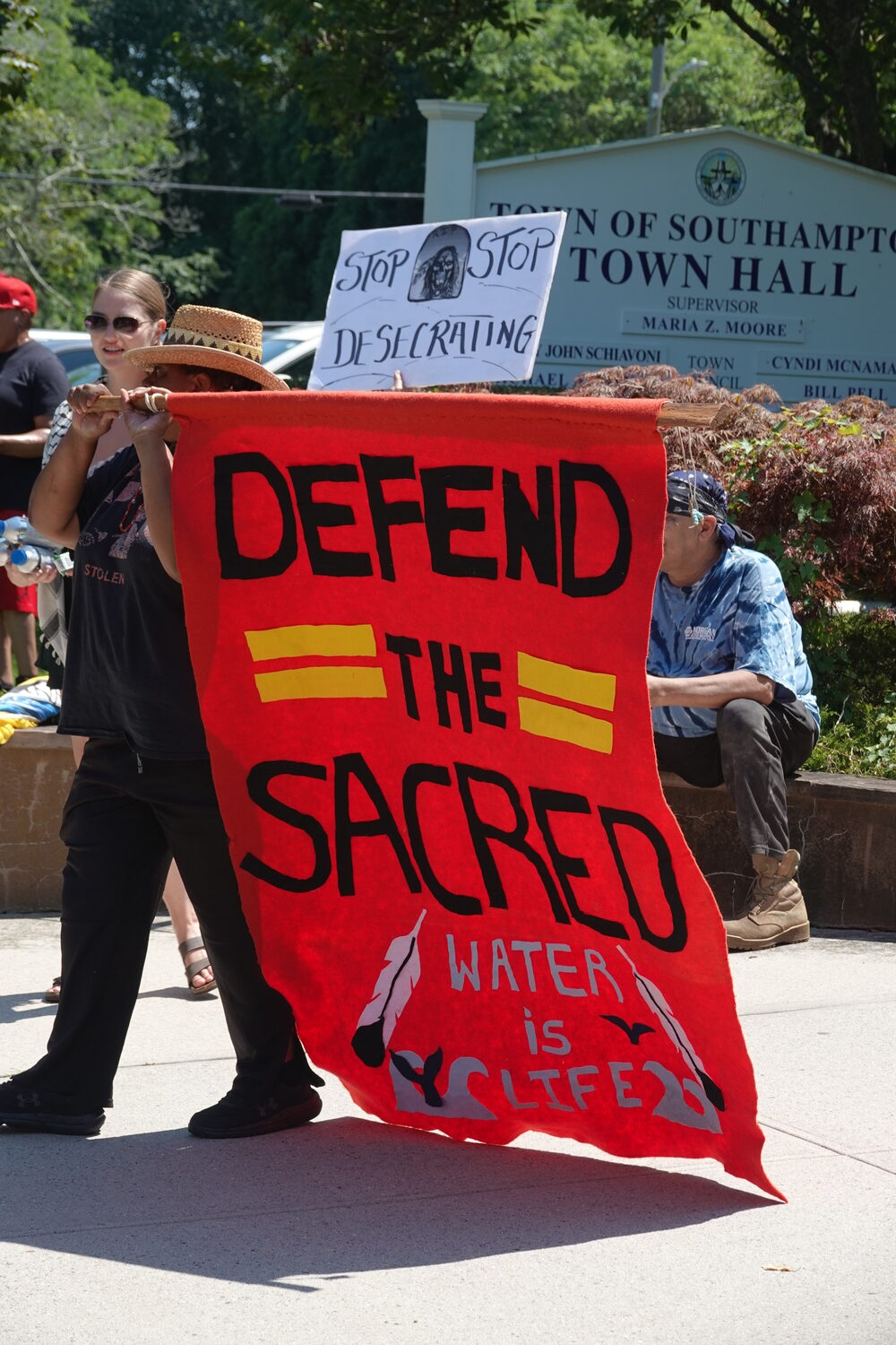 Members of the Shinnecock Nation and their supporters held a rally outside Southampton Town Hall on Monday calling on Southampton Town to dedicated more money from the Community Preservation Fund to preserving more of the tribe's ancestral lands in Shinnecock Hills. MICHAEL WRIGHT