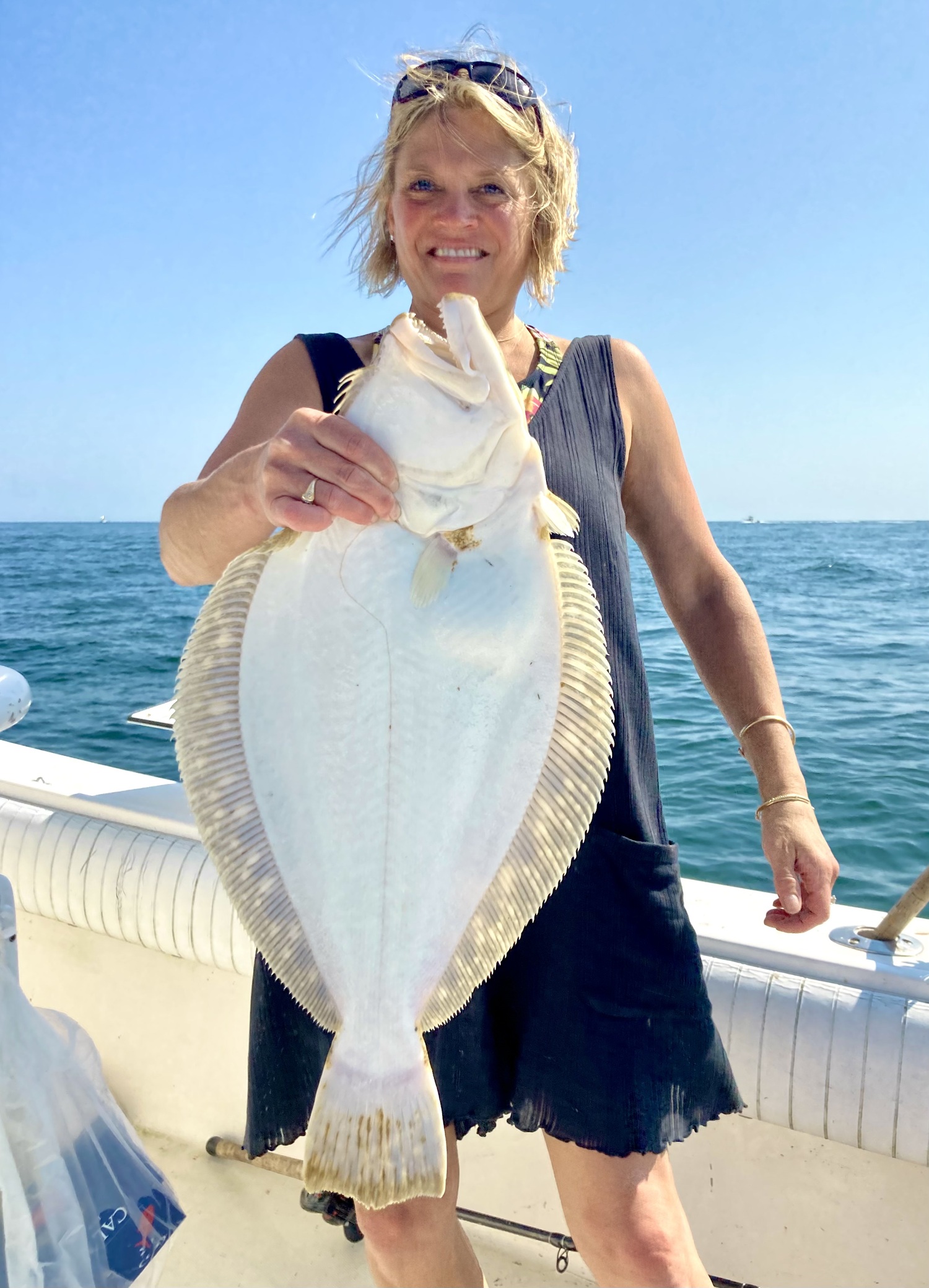 Joanna Gaber decked this nice fluke while fishing off Montauk last week. GREG FLANAGAN