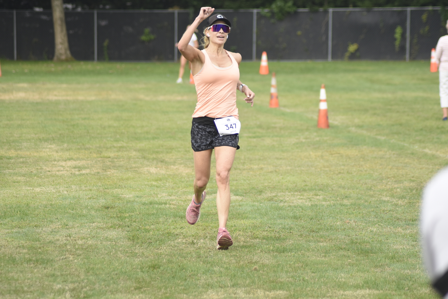 Sasha Kemnitzer was the female champion of Saturday morning's 5K.   DREW BUDD