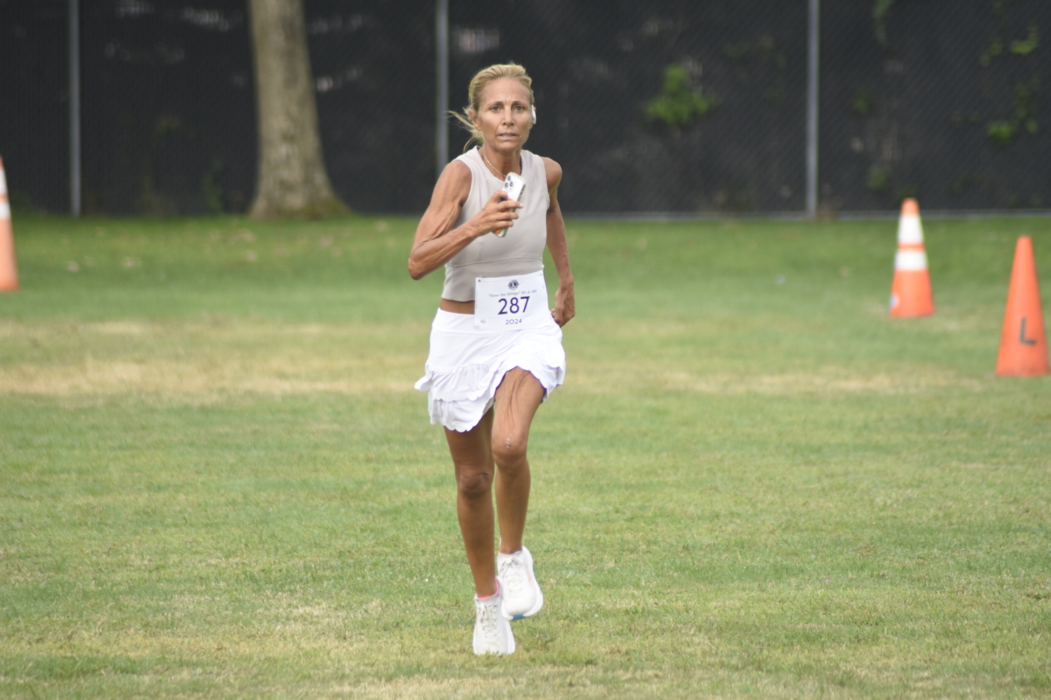 Jennifer Smith placed third among women in Saturday morning's 5K.   DREW BUDD