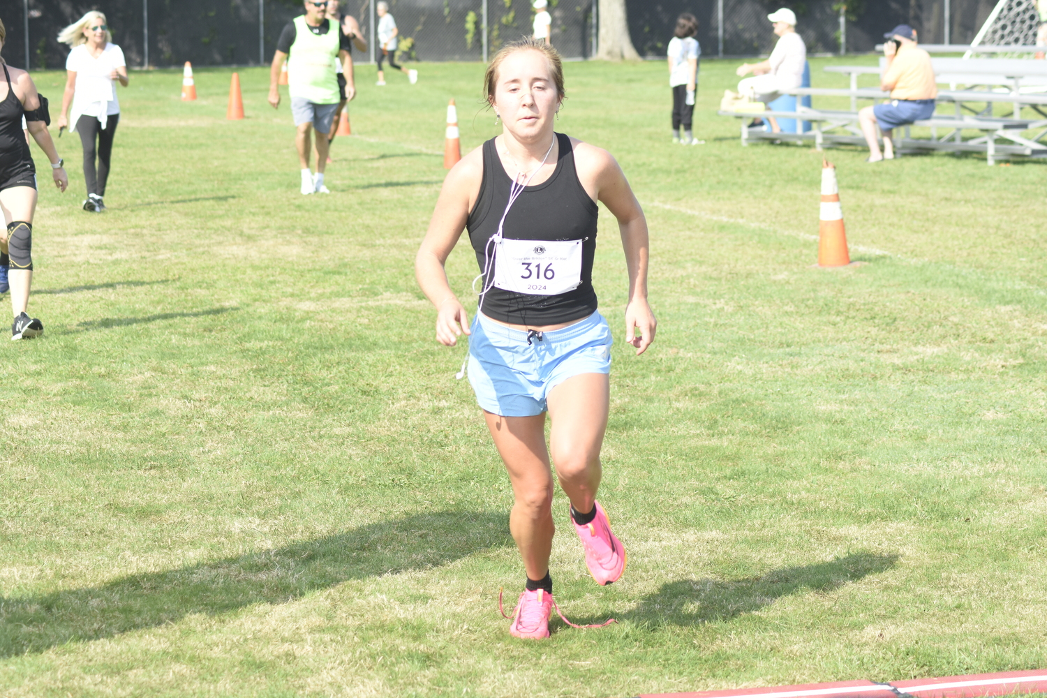 Alyssa Bahel placed second among women in the 10K.  DREW BUDD