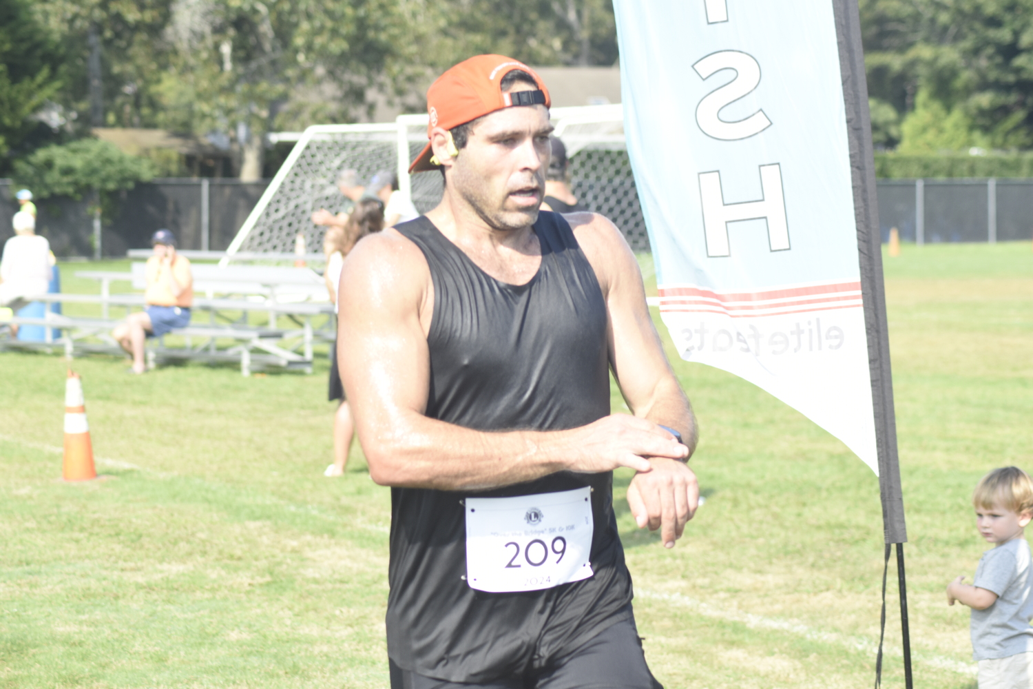 Chris Lorenzini placed fourth among male runners in the 10K.  DREW BUDD