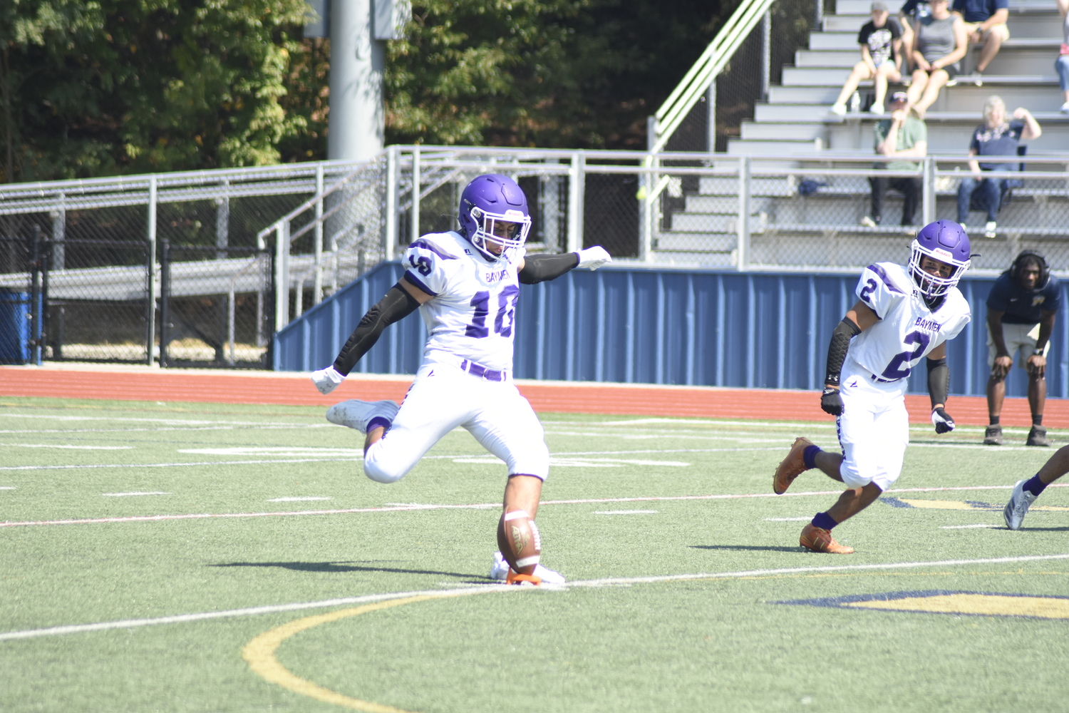 Josh Reyes gets the 2024 season underway for the Baymen, their first varsity season in two years, at Shoreham-Wading River on Saturday afternoon.   DREW BUDD