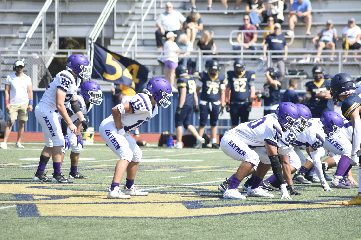 The Baymen line up for their first offensive play of the game.   DREW BUDD