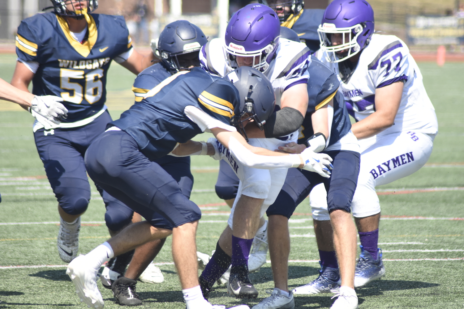 Nate Donahue rumbles into the end zone for the Baymen's first touchdown of the game.  DREW BUDD