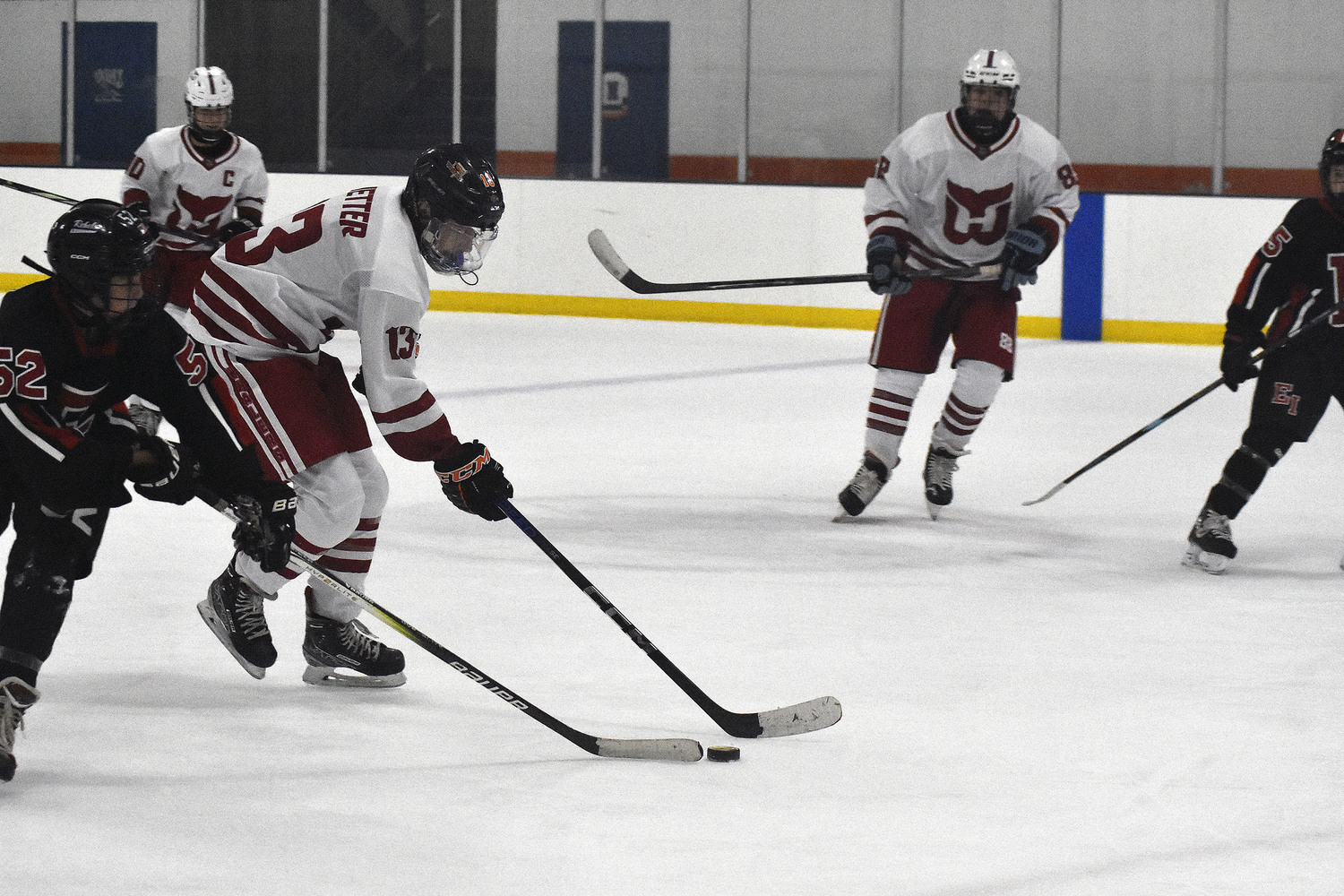 Andrew Wetter brings the puck down the ice. He scored a pair of goals in the game include the first ever for the Whalers.   DREW BUDD