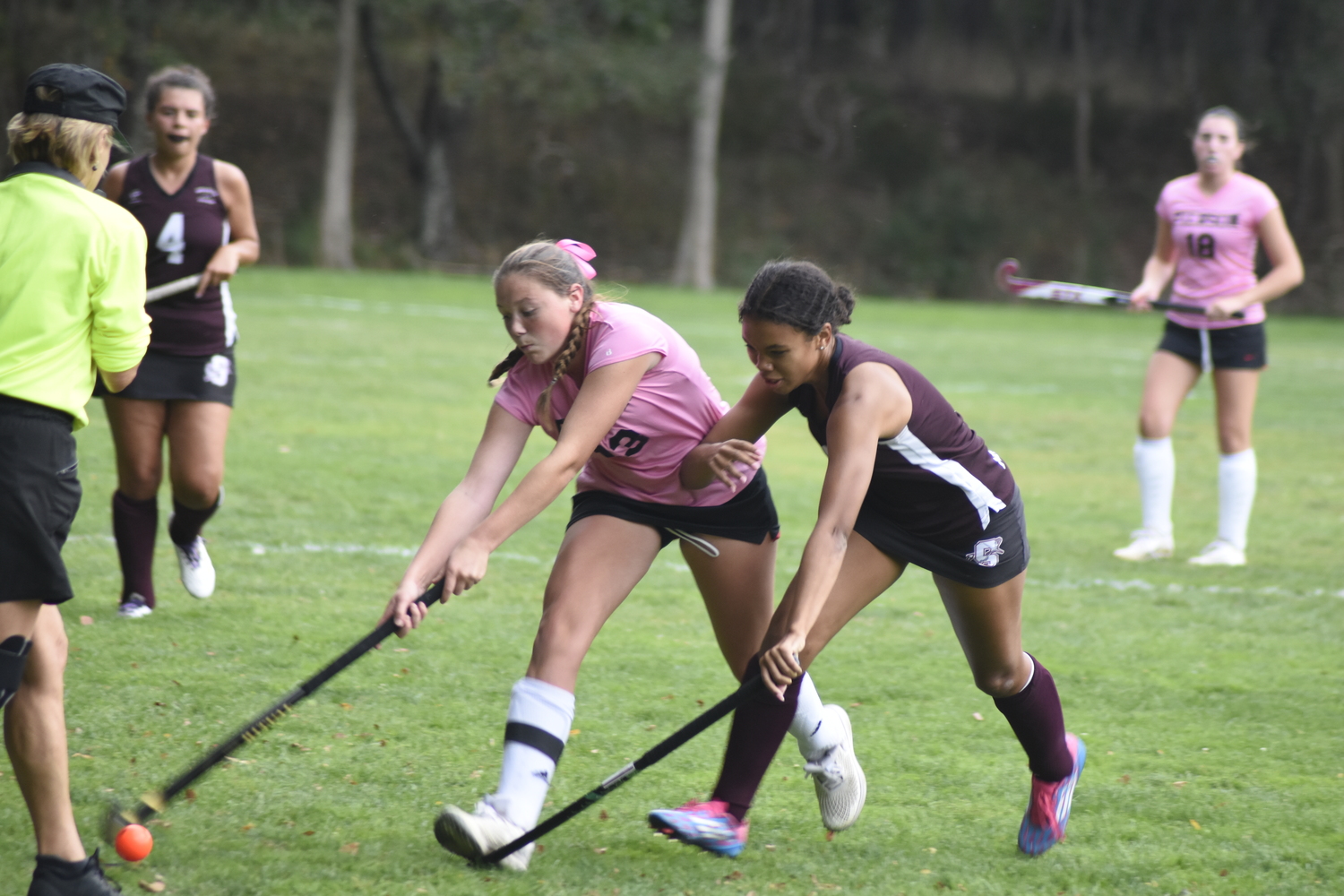 Pierson senior Cali Wilson gets the ball just before it goes out of bounds and just before Southampton senior Mya Halsey.   DREW BUDD