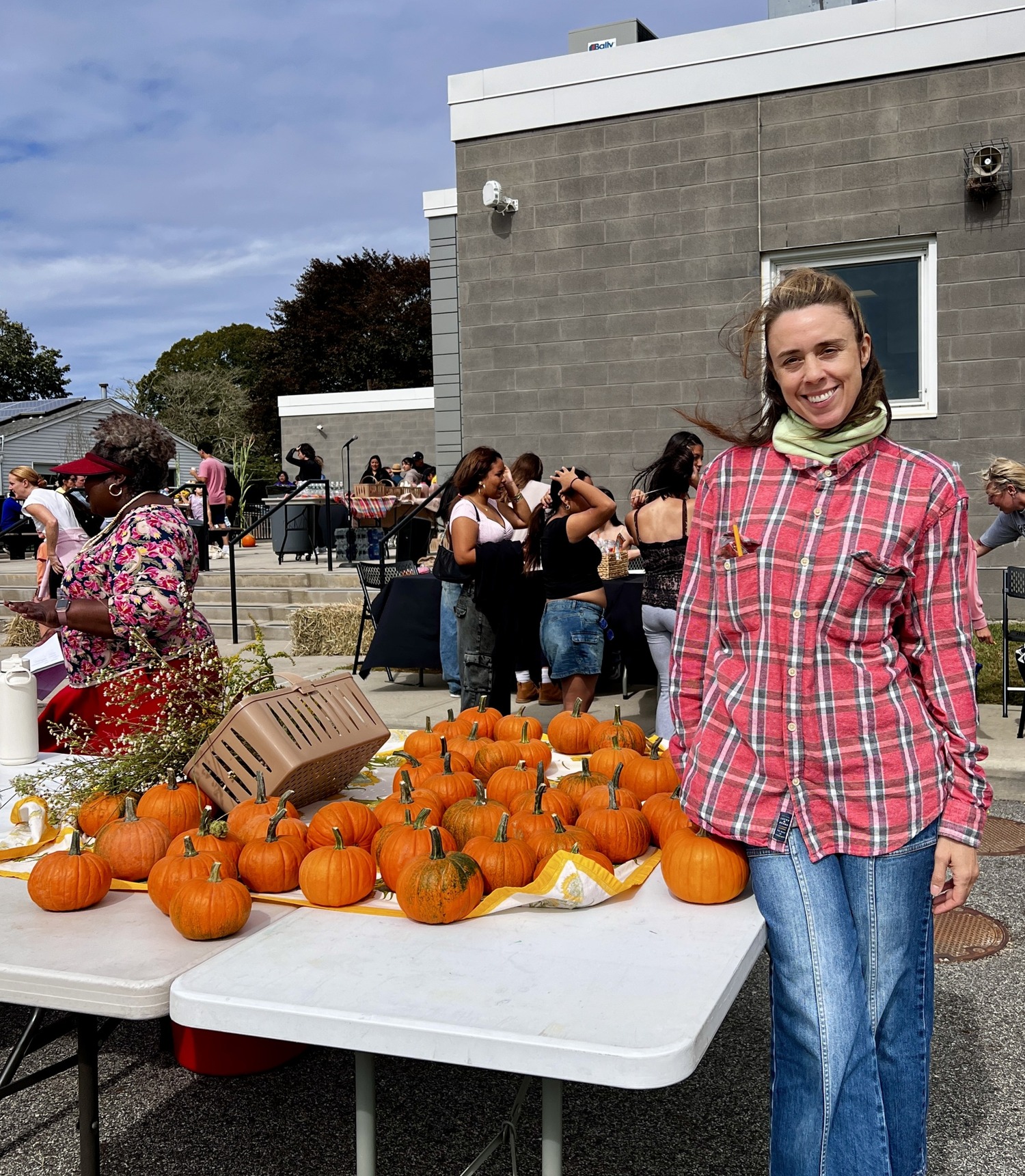 The Bridgehampton School continued its annual tradition last weekend by hosting a Fall Festival. Sponsored by the school’s 21st Century Community Learning Center grant,
students and families enjoyed music, face painting, pumpkin decorating and food.
PTO volunteer Francesca Channing manned the pumpkin station. COURTESY BRIDGEHAMPTON SCHOOL DISTRICT