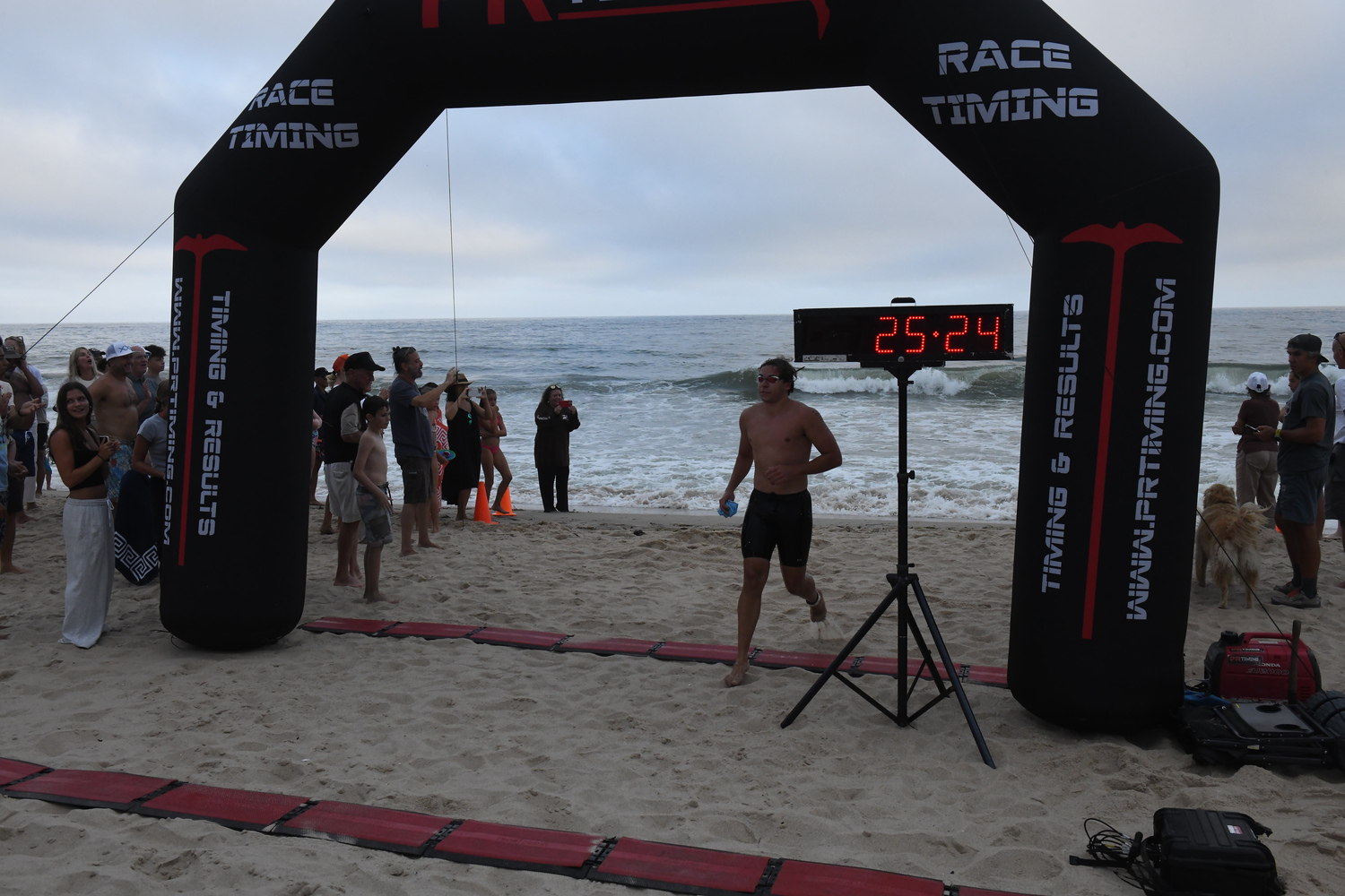 East Hampton Volunteer Ocean Rescue hosted its annual Red Devil Swim at Atlantic Avenue Beach in Amagansett on Saturday evening.   DOUG KUNTZ