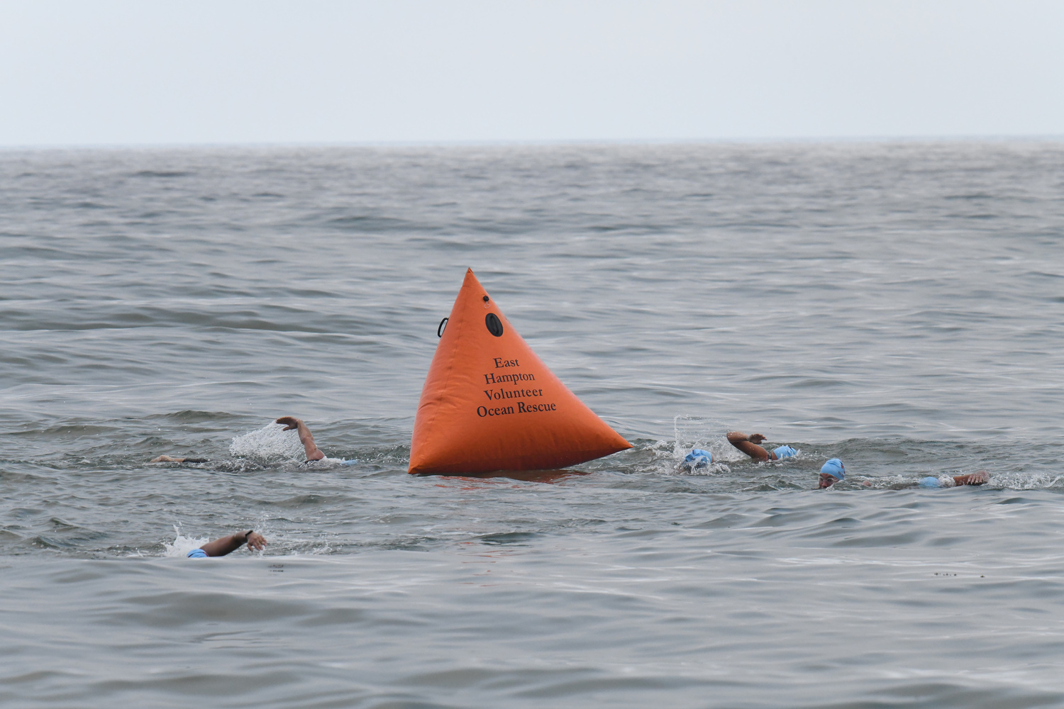 East Hampton Volunteer Ocean Rescue hosted its annual Red Devil Swim at Atlantic Avenue Beach in Amagansett on Saturday evening.   DOUG KUNTZ