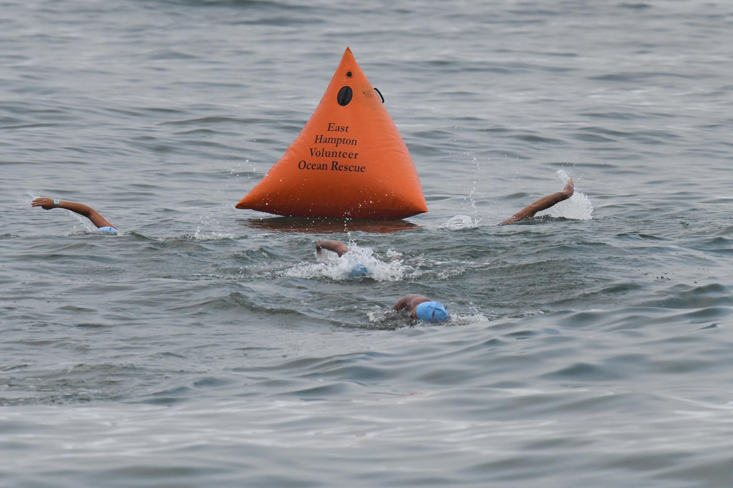 East Hampton Volunteer Ocean Rescue hosted its annual Red Devil Swim at Atlantic Avenue Beach in Amagansett on Saturday evening.   DOUG KUNTZ