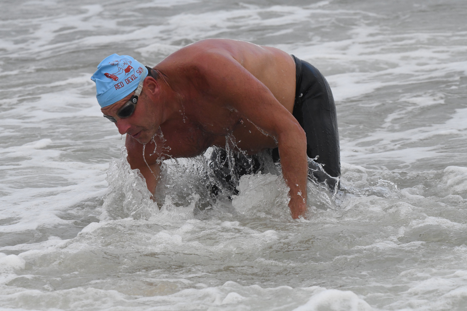 East Hampton Volunteer Ocean Rescue hosted its annual Red Devil Swim at Atlantic Avenue Beach in Amagansett on Saturday evening.   DOUG KUNTZ