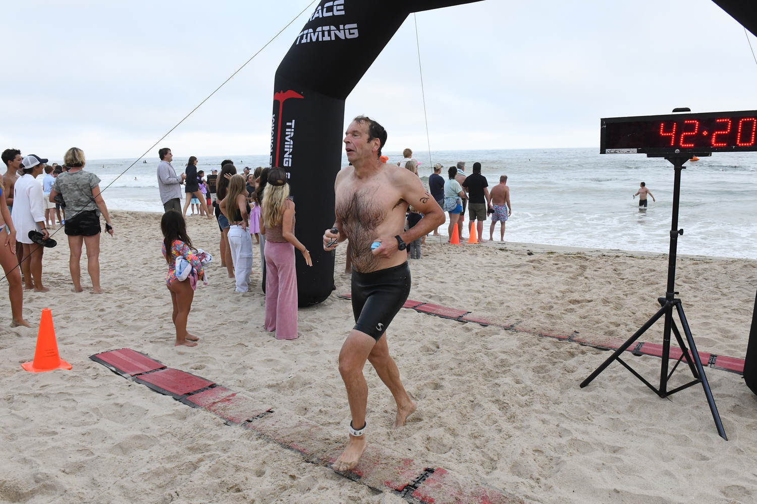 East Hampton Volunteer Ocean Rescue hosted its annual Red Devil Swim at Atlantic Avenue Beach in Amagansett on Saturday evening.   DOUG KUNTZ