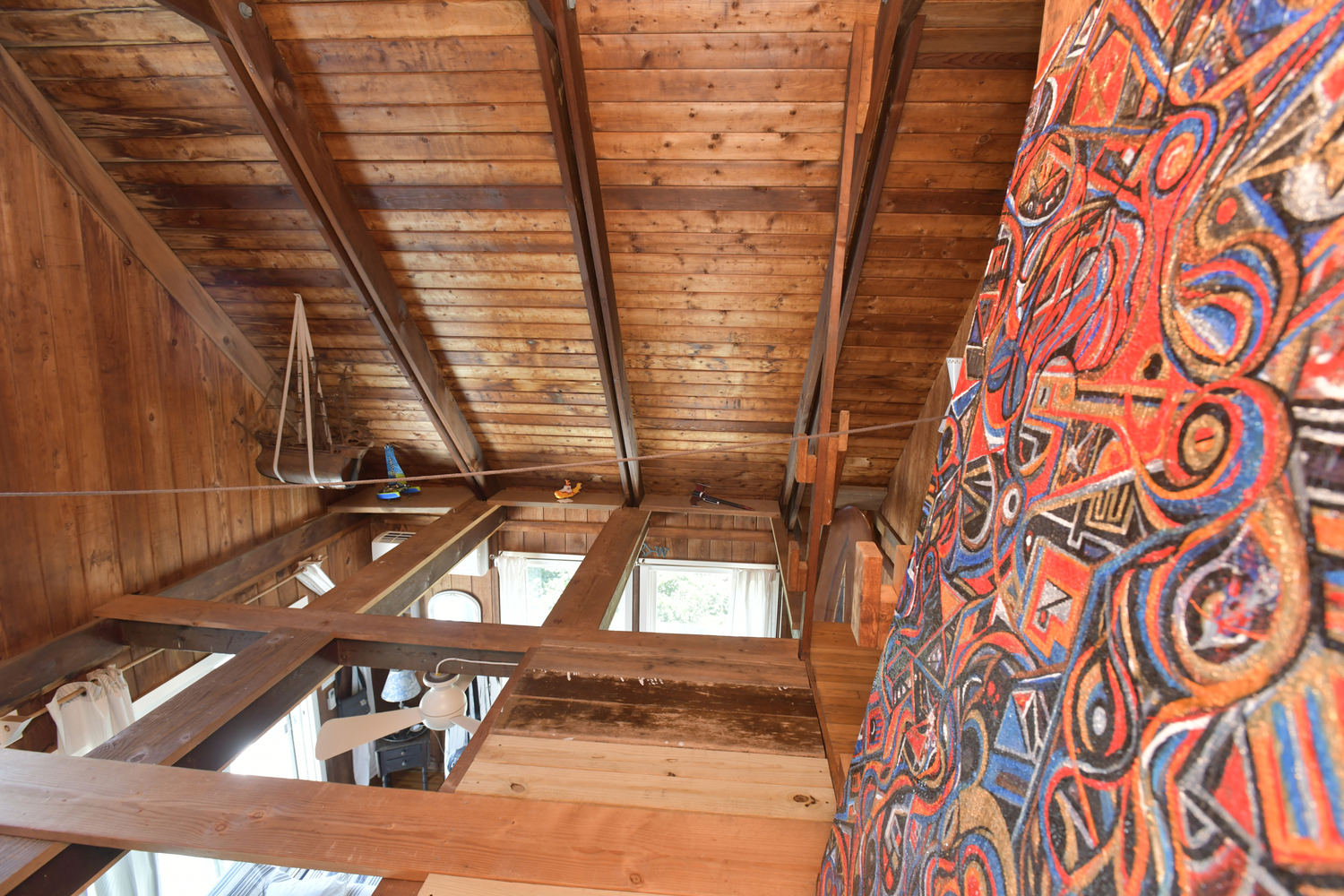 The open loft overlooking the kitchen and living areas.  DANA SHAW