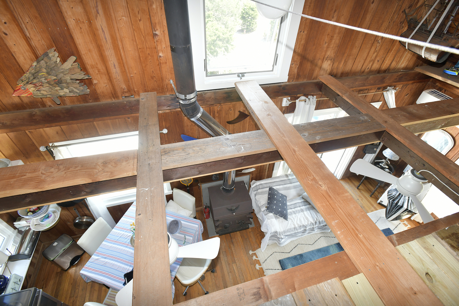 The open loft overlooking the kitchen and living areas.  DANA SHAW