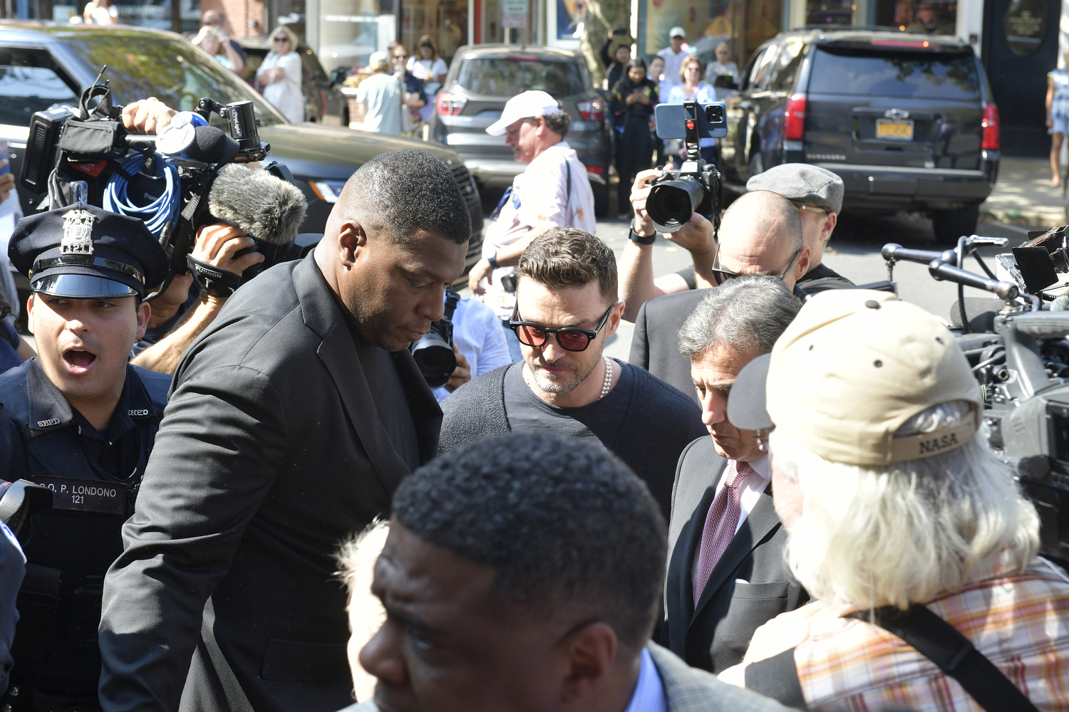 Justin Timberlake makes his way through the media scrum on his way to Sag Harbor Village Justice Court on Friday morning.    DANA SHAW