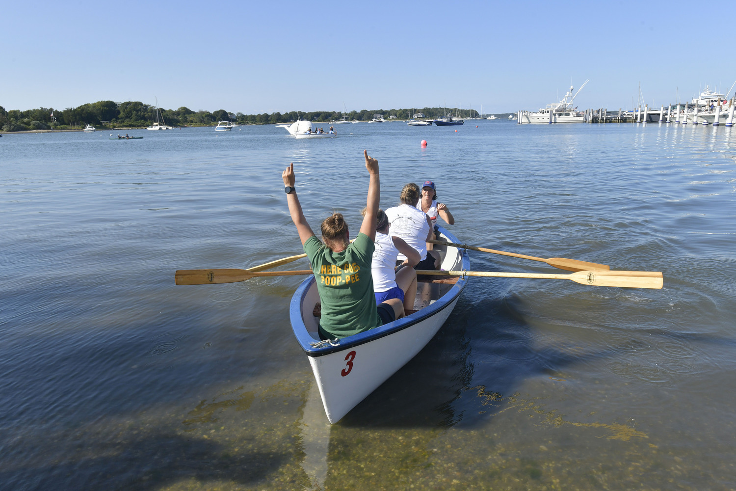 The John K. Ott Women's Whaleboat Team took the trophy in the Women's Championship on Sunday afternoon.   DANA SHAW