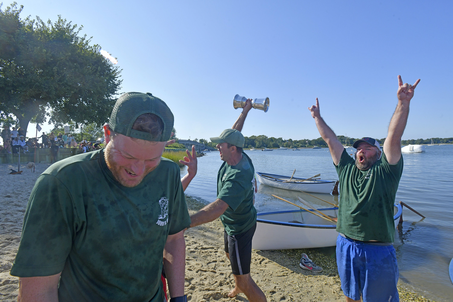 The John K. Ott Men's Whaleboat team celebrates after securing the Championship once again.   DANA SHAW