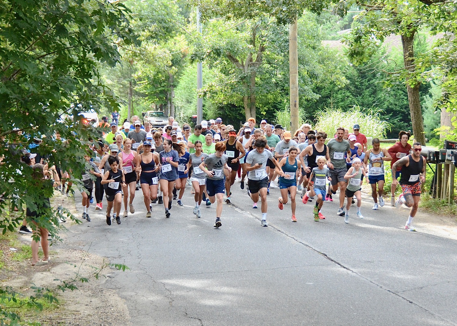 Runners start the Great Bonac Footraces on Labor Day morning in Springs.   KYRIL BROMLEY