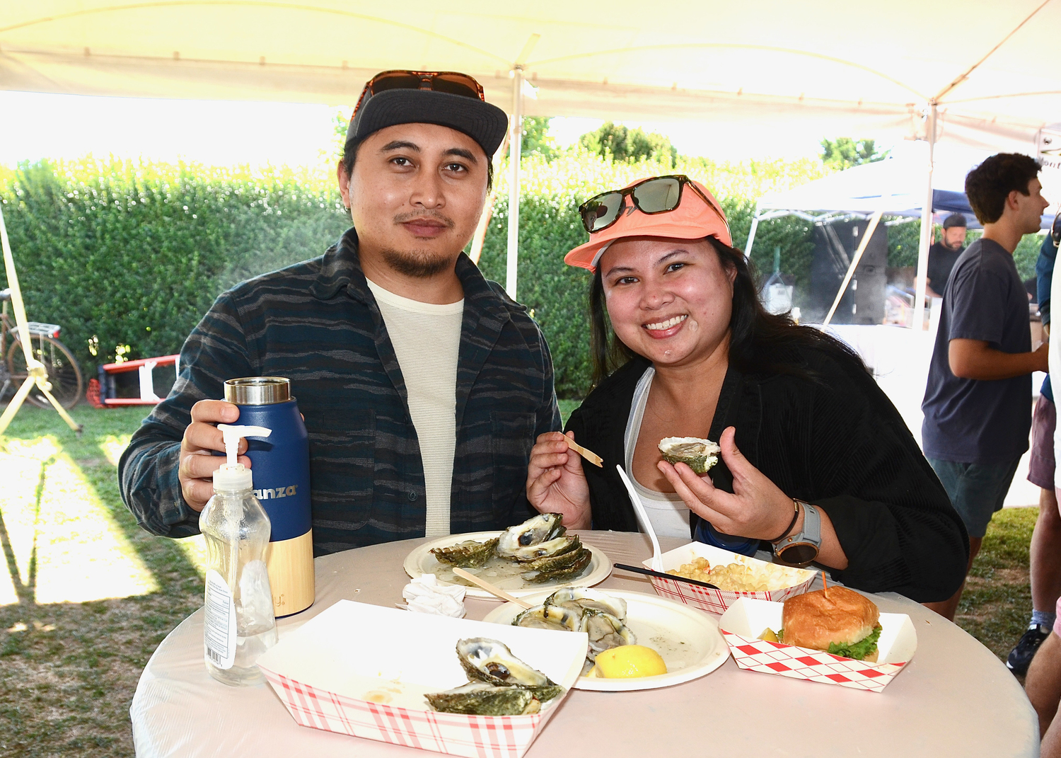 Stephen Sumergido and Lea Aclan at the Montauk Seafood Festival on Sunday.  KYRIL BROMLEY