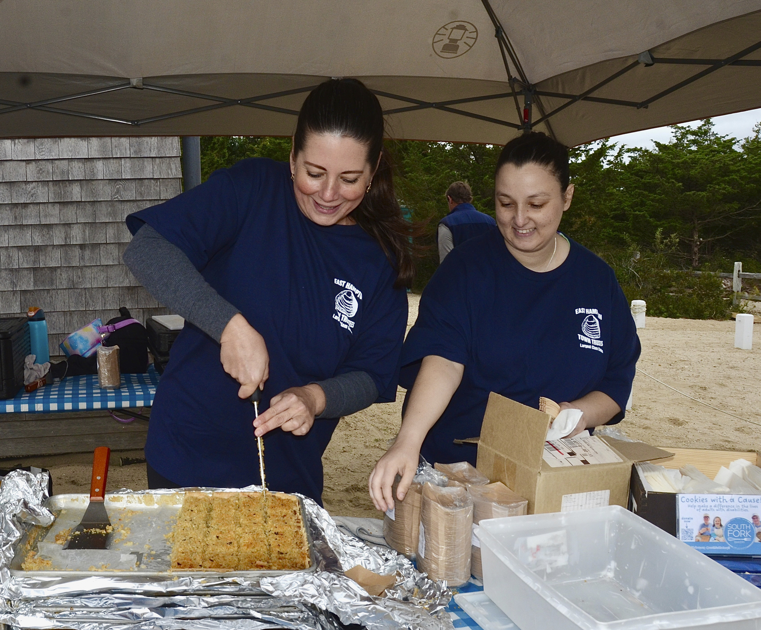 Jessica Taccone and Sasha Garcia dish out the clam pies.  KYRIL BROMLEY