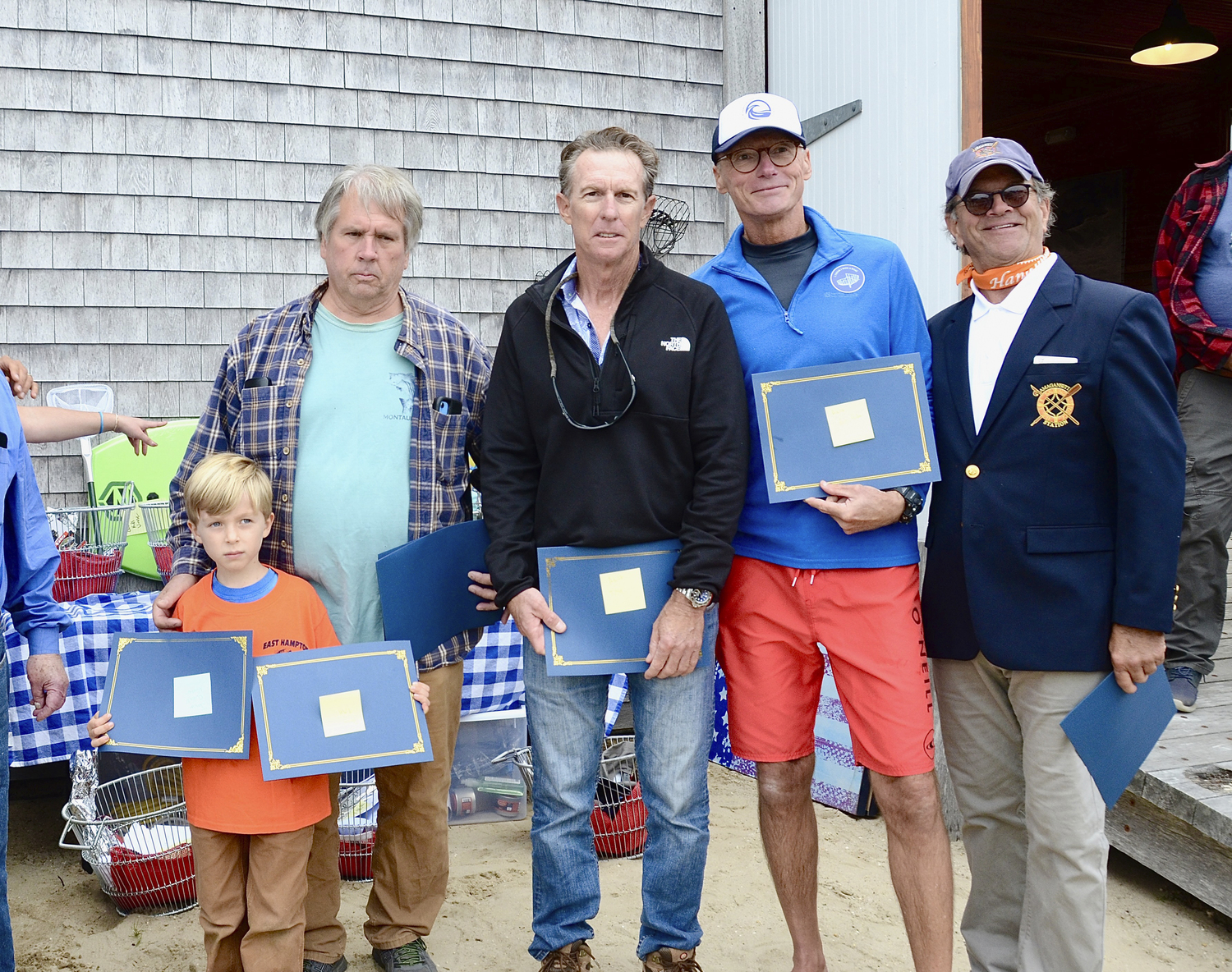 Largest Clam winners ( from various harbors). Wesley Aldridge, Mike Fromm, Frank Ganley, Dan Morgan, with Michael Cinque at right.  KYRIL BROMLEY