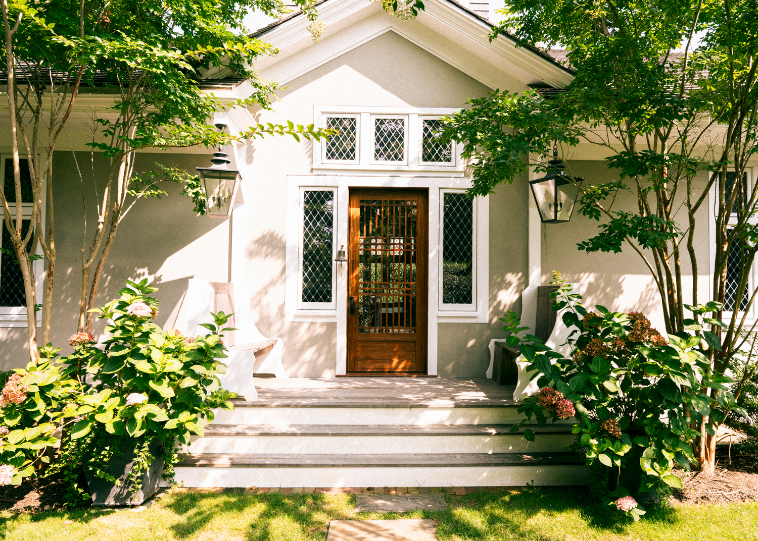 A luscious garden frames the entryway. MACRAE MARRAN