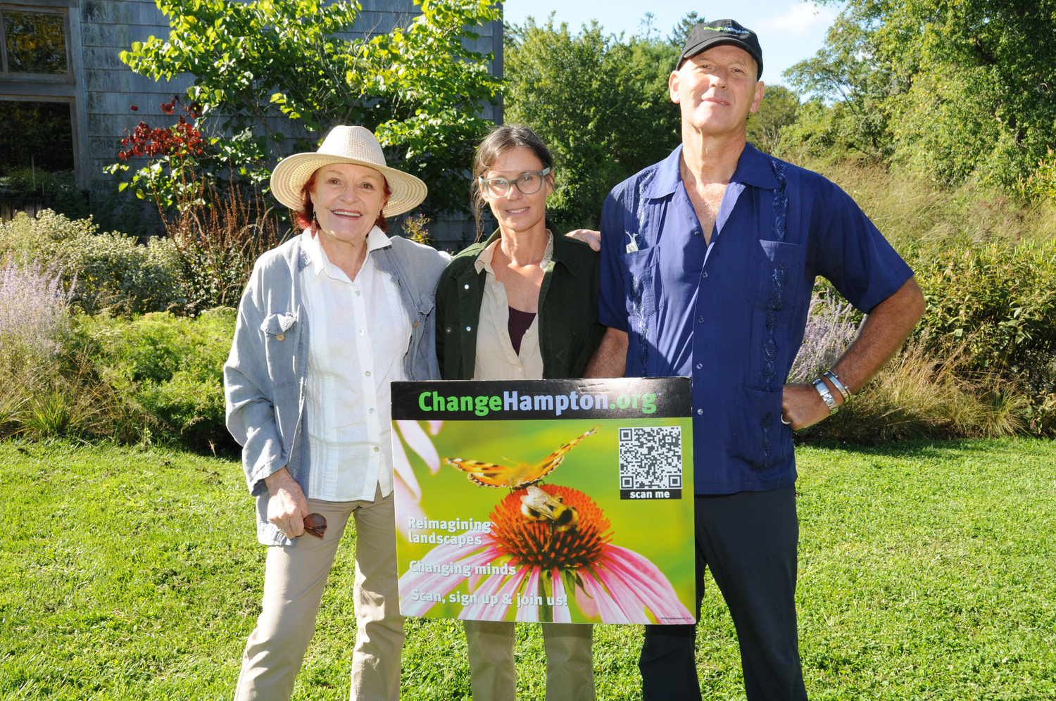 Gail Pellett, guest speaker Abby Clough Lawless, and Stephan Van Dam at  the ChangeHampton Pollinator Garden on the grounds of East Hampton's Town Hall on Sunday. Clough Lawless spoke about the amazing progress of the growth of the Pollinator Garden since it's planting in 2022, RICHARD LEWIN