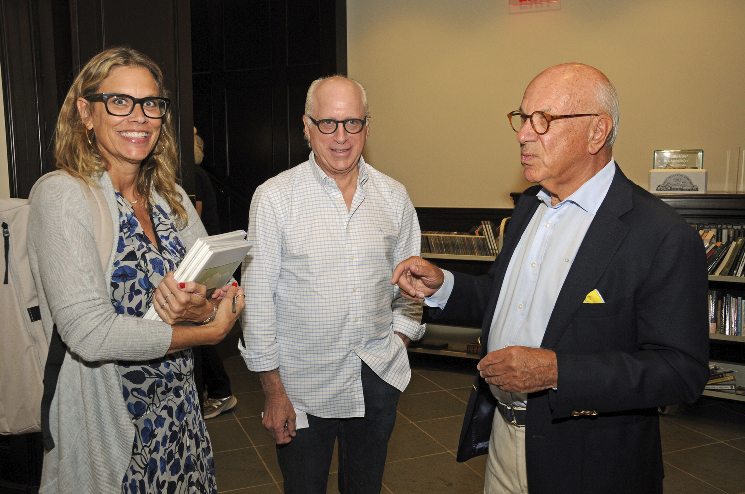 Amanda Star Frazer, Jeffrey Bragman with Lenny Ackerman at The East Hampton Library on August 27, to hear about his latest book, 